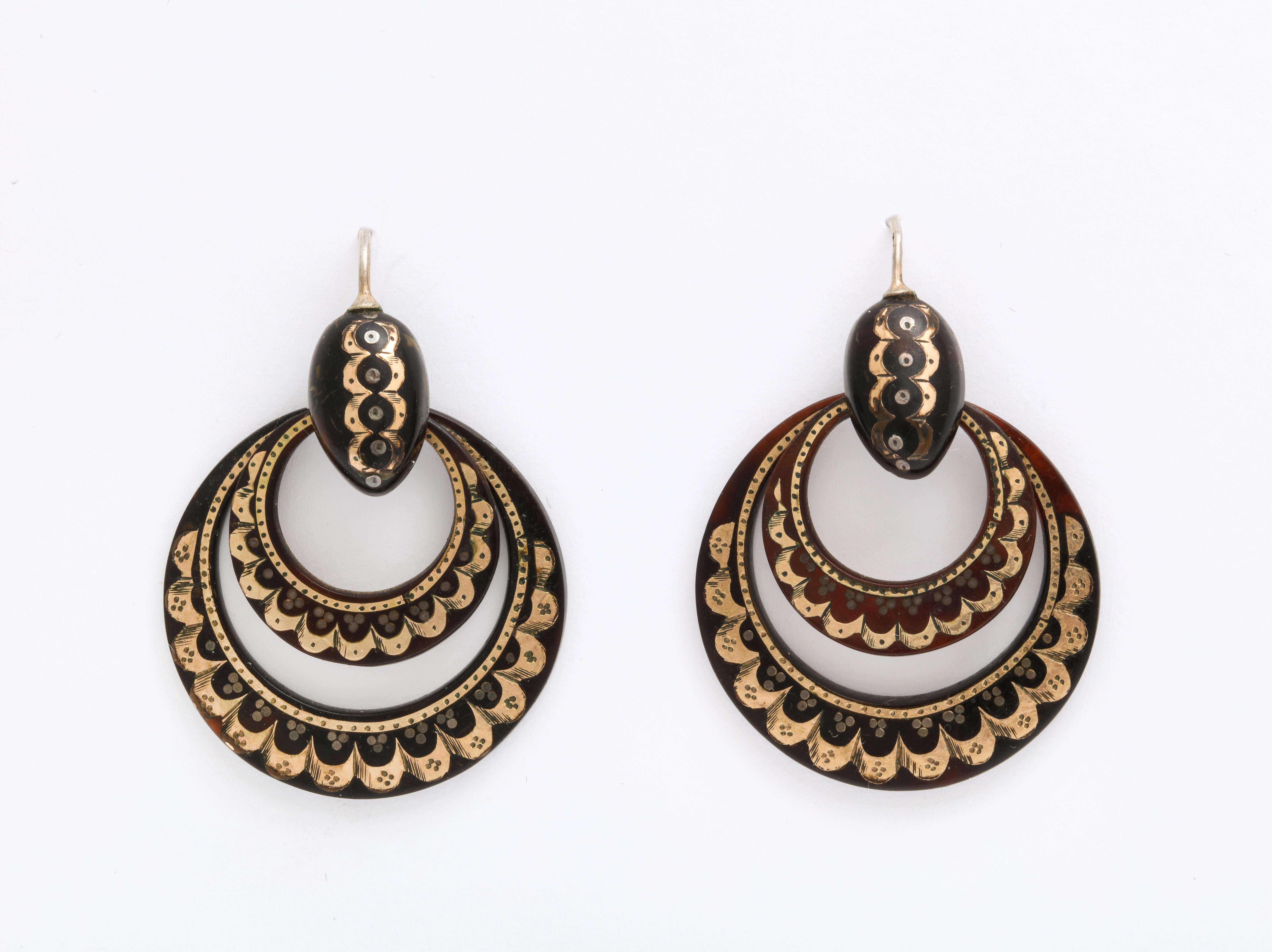 In Russia and in France c. 1870, the Art of pique was fashionable and the work to create it was highly acclaimed. These earrings were the go to for woman who were up to date. Long before we were conscious of endangered species, the shell of the
