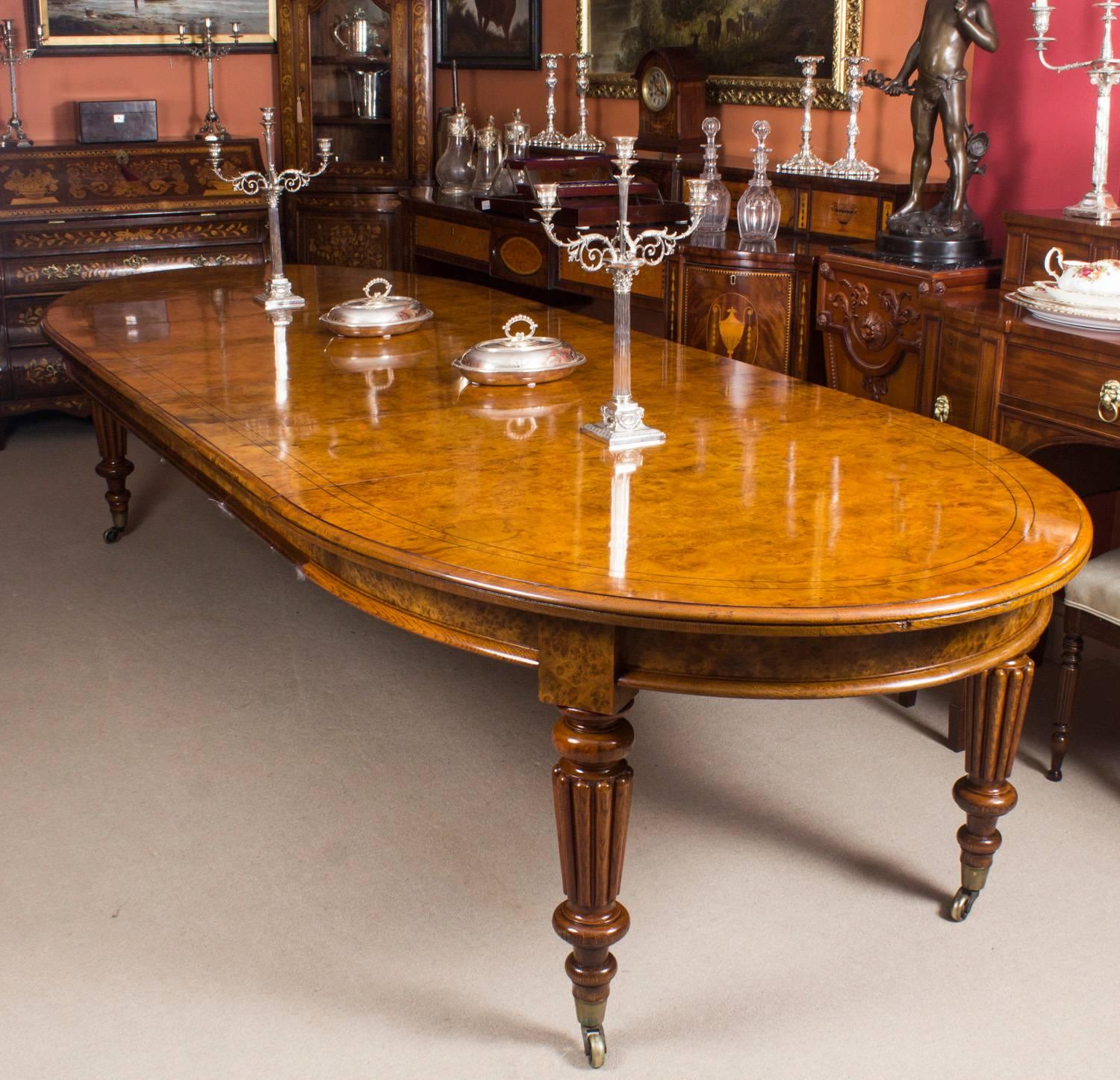 There is no mistaking the style and sophisticated design of this exquisite rare English antique Victorian pollard oak extending dining table, circa 1840 in date. This stunning dining table will stand out in your dining or conference room and will