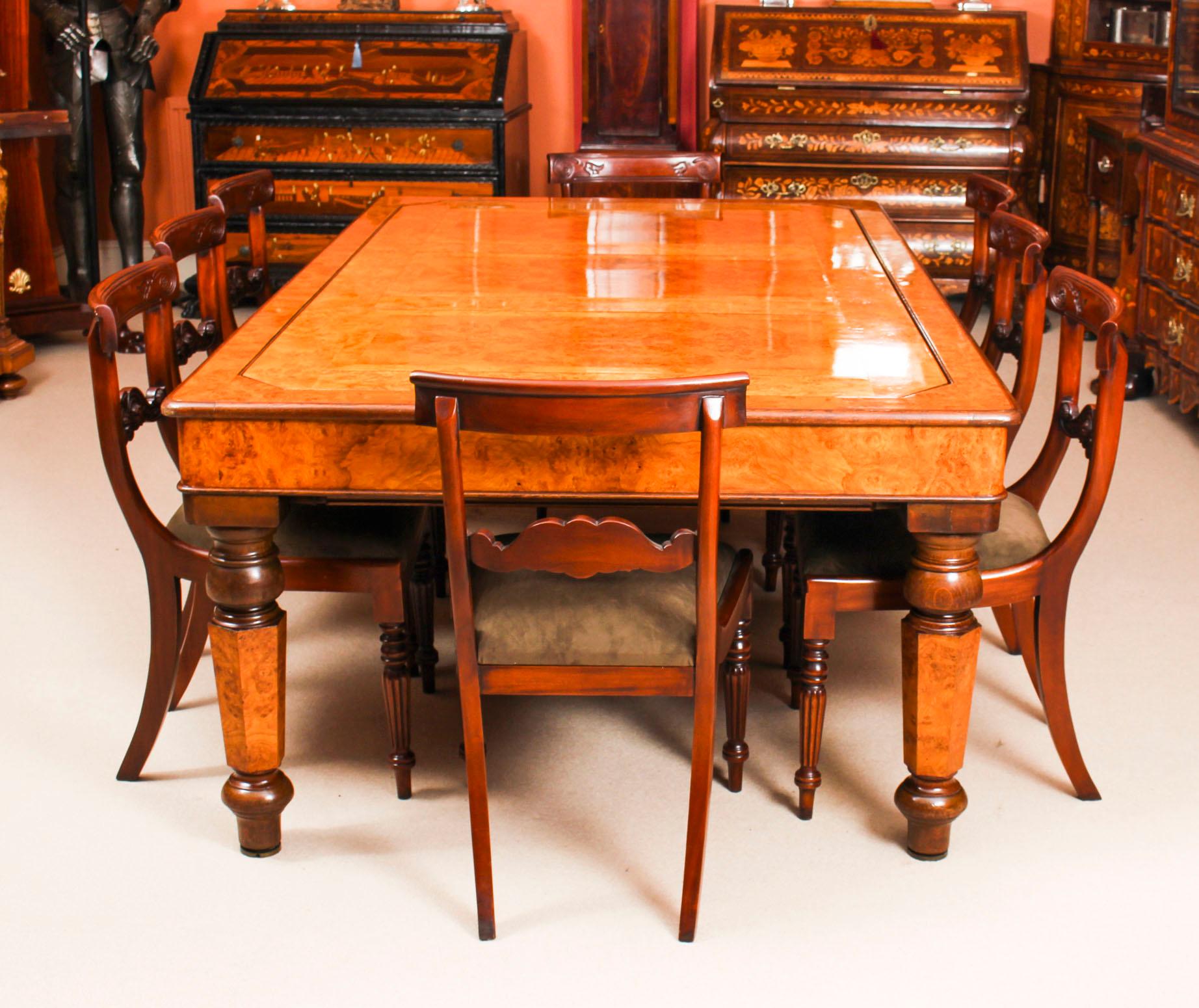There is no mistaking the style and sophisticated design of this exquisite and rare English Victorian Pollard oak revolving (or rollover) snooker dining table with score board, circa 1870 in date, and eight chairs. 

The table bearing an ivorine