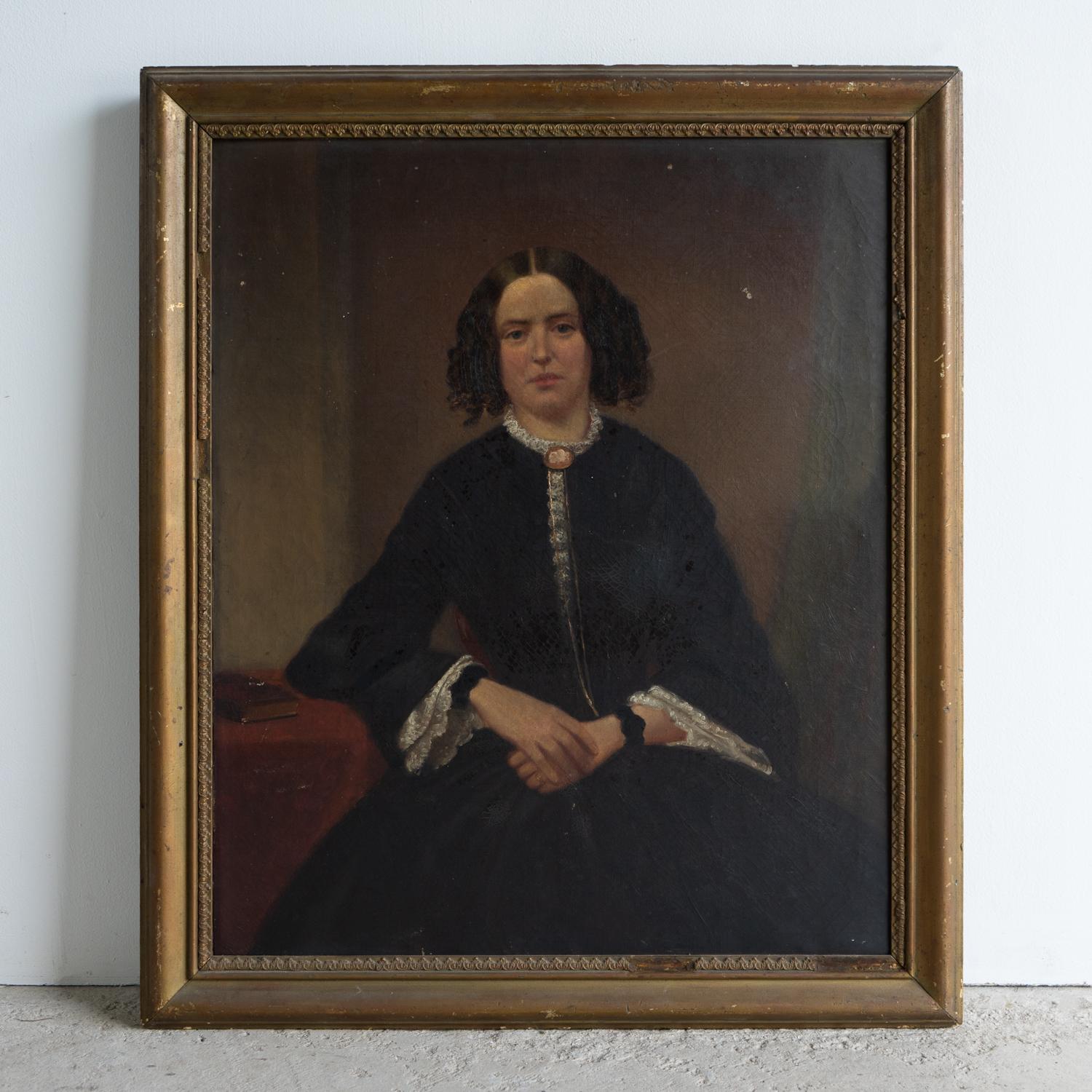 ANTIQUE ORIGINAL OIL ON CANVAS PAINTING DEPICTING A FEMALE SITTER, 19TH CENTURY

A strong and confident young woman depicted with ringlets in her hair dressed in a black gown with lacy undergarments a cameo brooch and a jet bracelet.

Painted in a