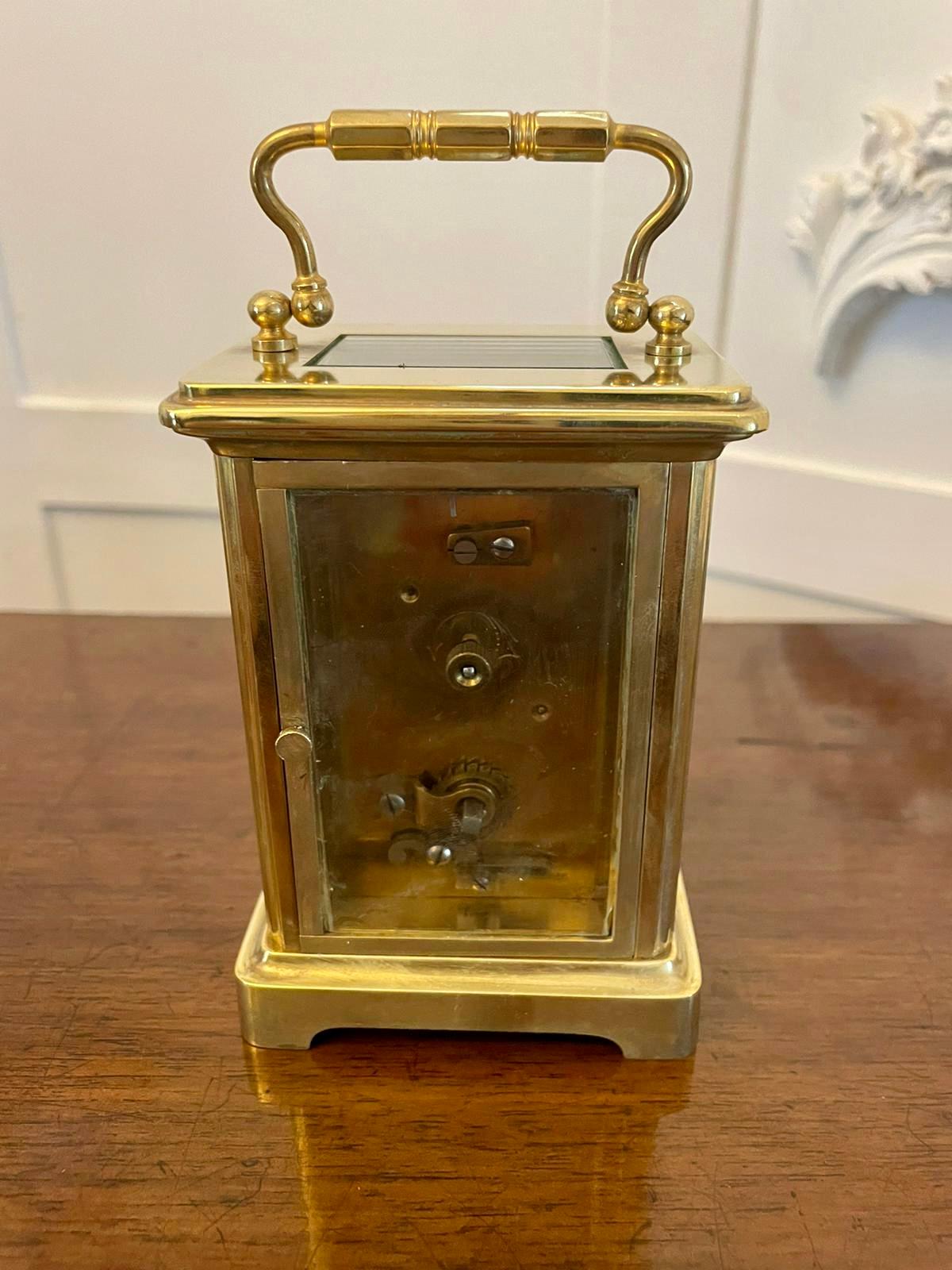 Antique Victorian quality brass carriage clock Having a quality brass carriage clock with bevelled edge glass panels white enamel dial with Roman numerals original hands 8 day movement and a shaped carrying handle to the top 


A classic example in