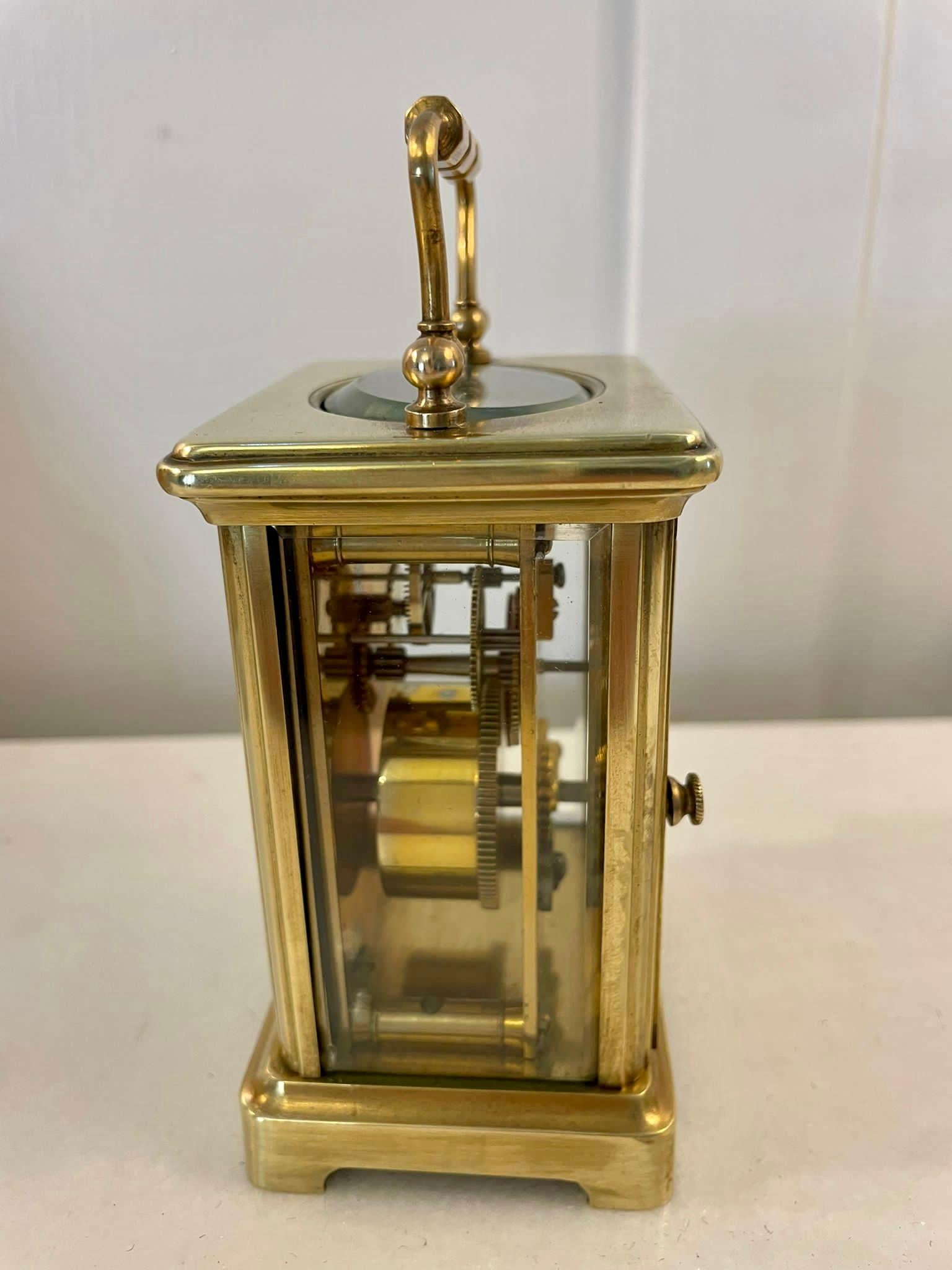 Antique Victorian quality brass carriage clock having bevelled edged glass panels, white enamel dial with Roman numerals, original hands, 8 day movement and a shaped carrying handle to the top 


In good working order


Dimensions:
Height 14.5 cm