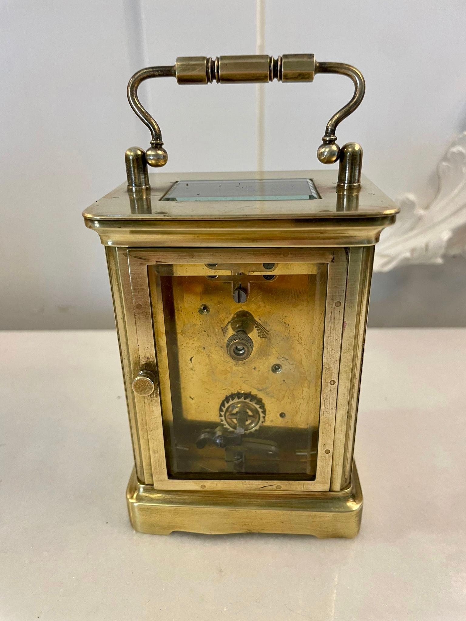 Antique Victorian quality brass carriage clock having a bevelled edge,  glass panels,  white enamel dial with Roman numerals,  original hands,  8 day movement and a shaped carrying handle to the top 


In good working order


Dimensions:
Height 14.5
