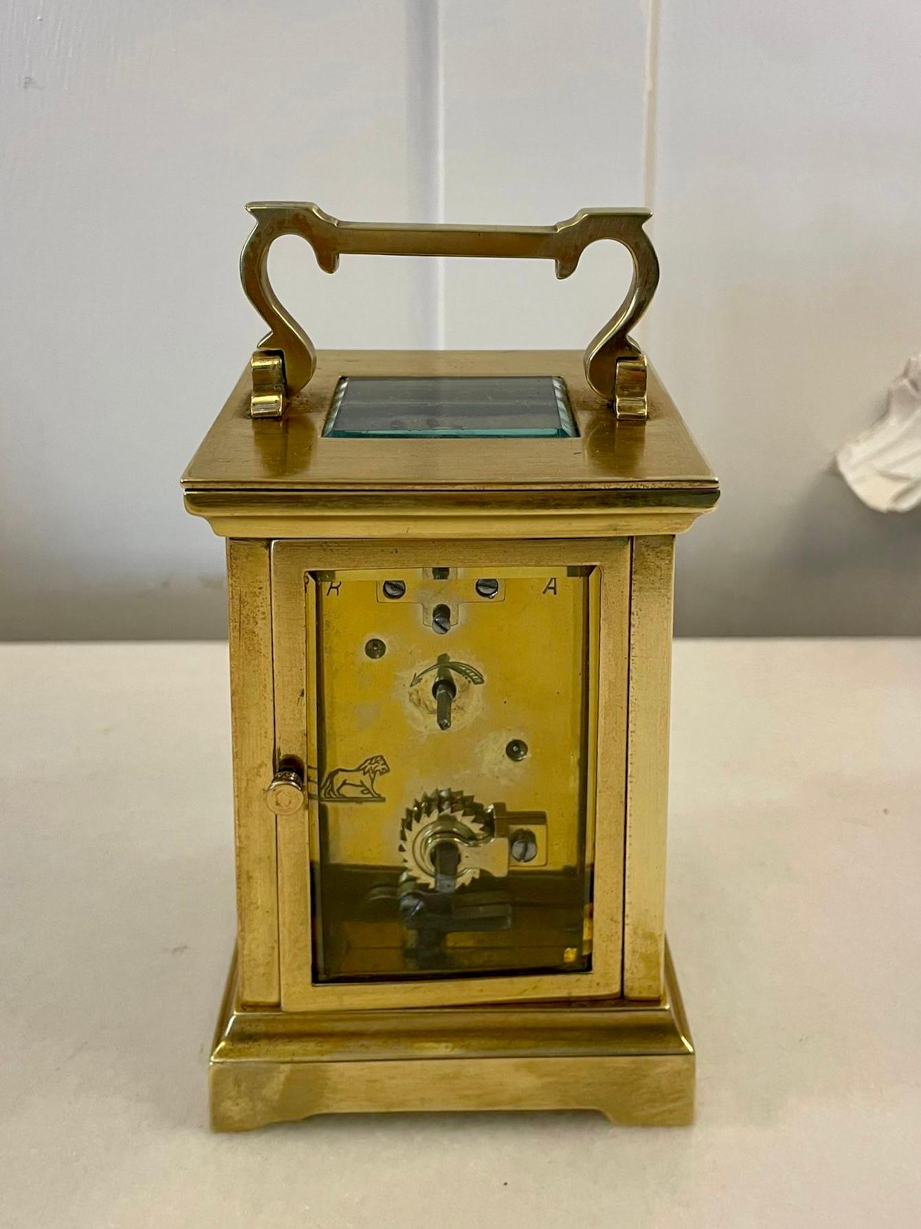 Antique Victorian quality brass carriage clock having a bevelled edge,  glass panels,  white enamel dial with Roman numerals,  original hands,  8 day movement and a shaped carrying handle to the top


In good working order


Dimensions:
Height 14.5