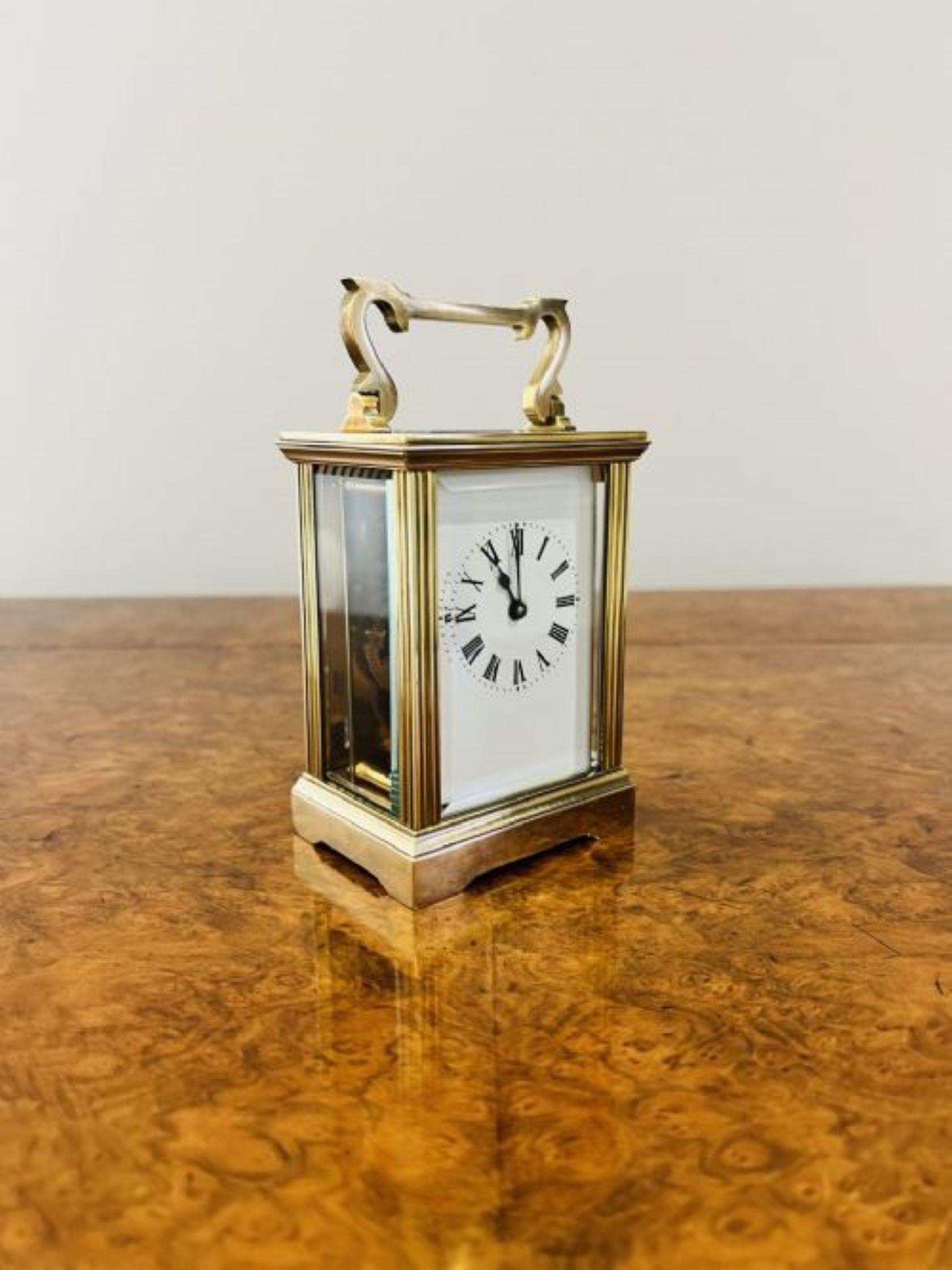 Antique Victorian quality brass carriage clock having a quality brass carriage clock with an eight day French movement, bevelled edge, glass panels and a shaped carrying handle to the top.
Please note all of our clocks are serviced prior to delivery