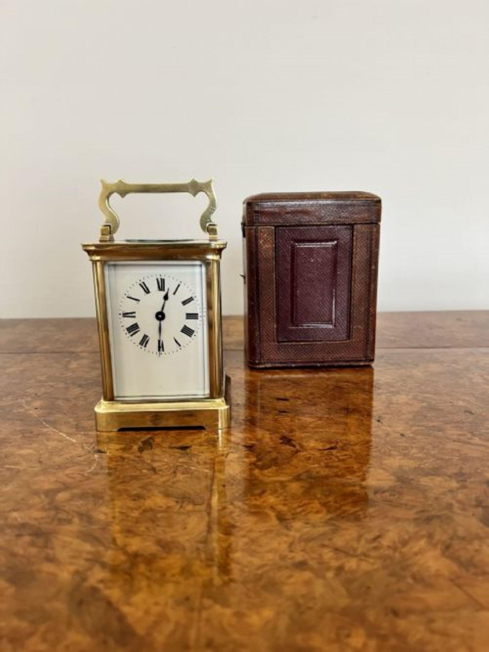 Antique Victorian quality brass carriage clock with the original leather travelling case, having a quality brass carriage clock with an eight day French movement, bevelled edge, glass panels and a shaped carrying handle to the top.
Please note all