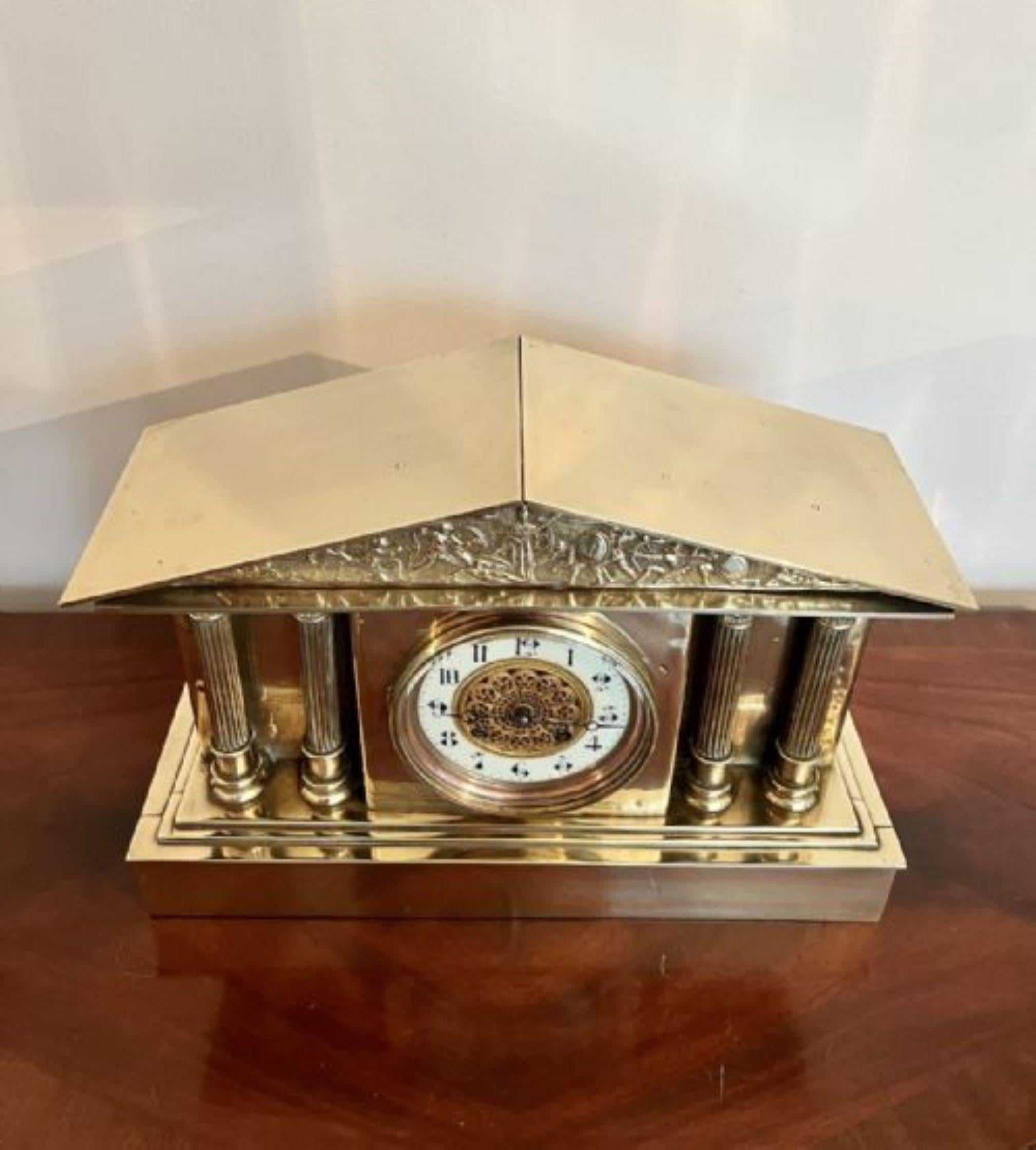 Antique Victorian quality brass mantle clock having a quality antique Victorian brass case with ornate decoration, circular dial with original hands, Roman numerals, 8 day French movement striking on the hour and half hour on a gong with the