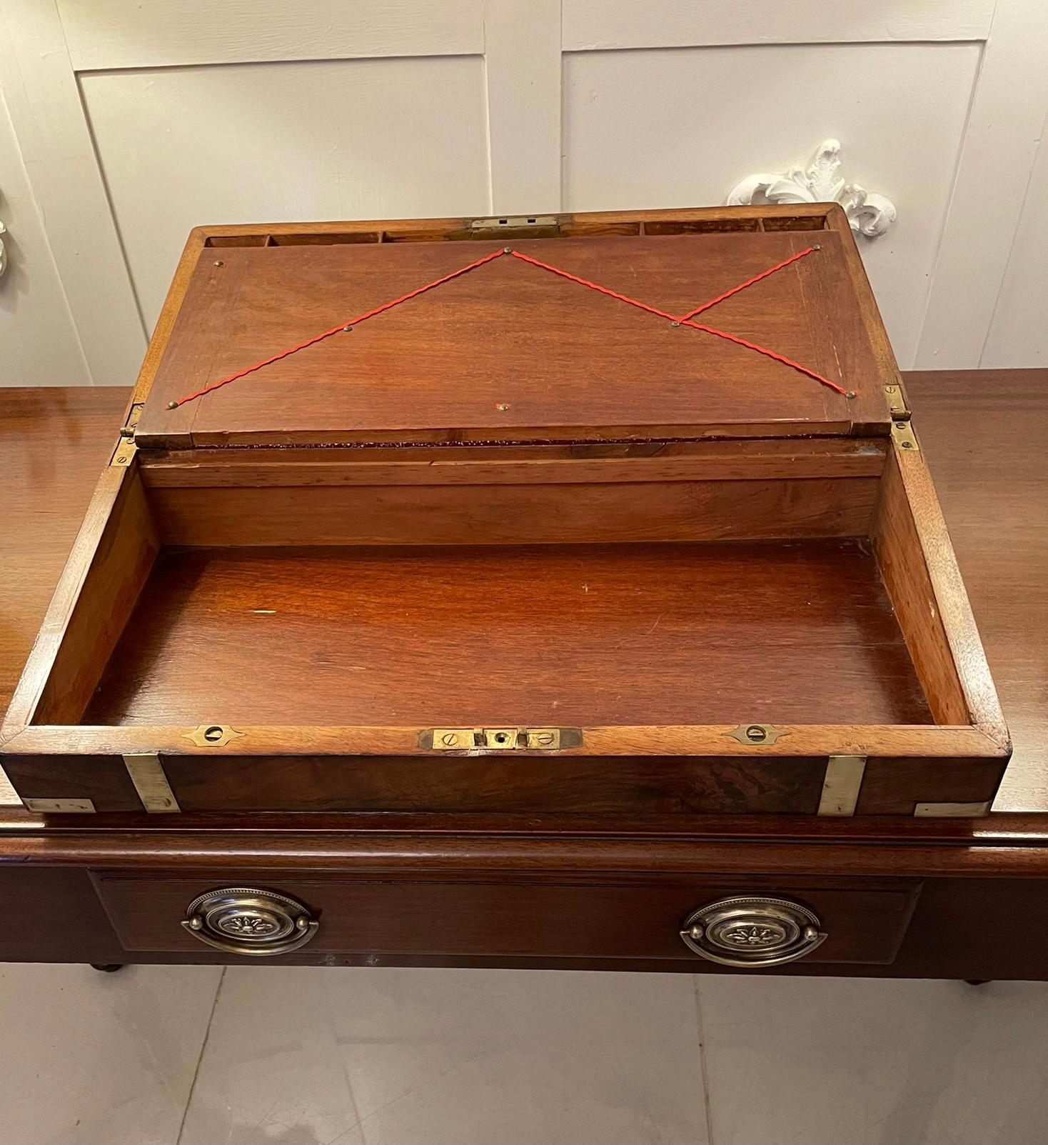 Antique Victorian quality burr walnut brass bound quality burr walnut writing box with brass corners and straps opening to reveal a fitted writing slope with a pen tray, two lift up lids opening to reveal a storage compartment including one with