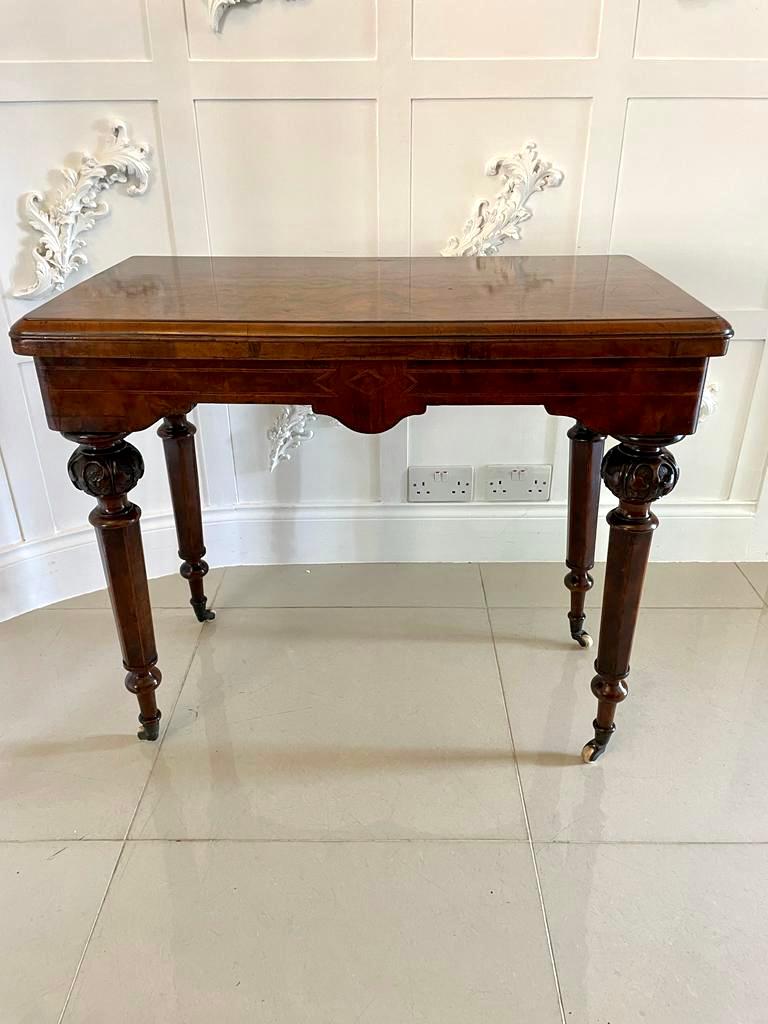 Antique Victorian quality burr walnut inlaid freestanding card/side table having a quality rectangular shaped burr walnut inlaid fold over top opening to reveal a baize interior, freestanding burr walnut inlaid frieze standing on four lovely carved