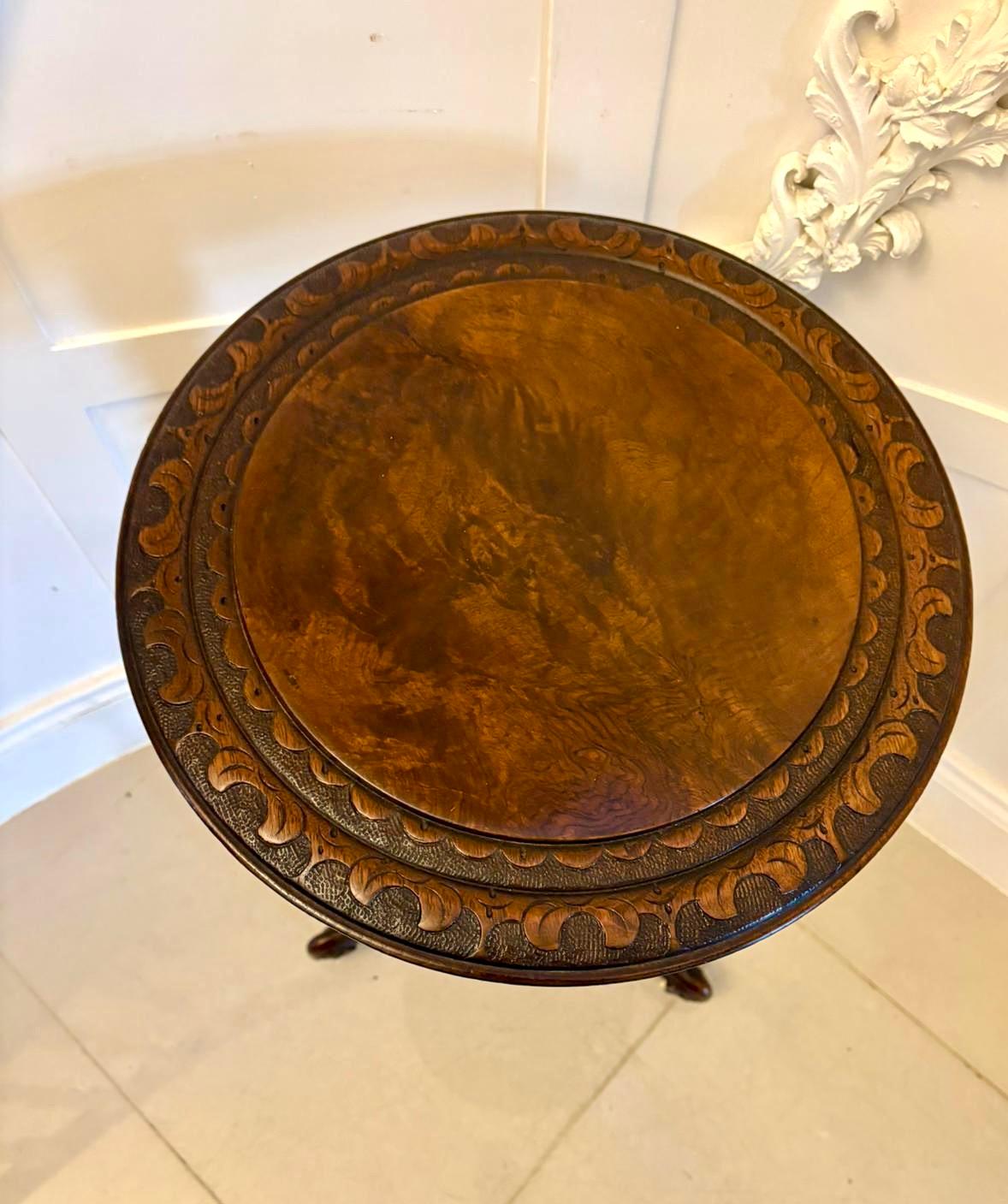 Antique Victorian quality carved burr walnut circular lamp table having a quality burr walnut circular shaped top with a fantastic carved edge supported by a turned tapering carved reeded pedestal column standing on three shaped carved cabriole legs