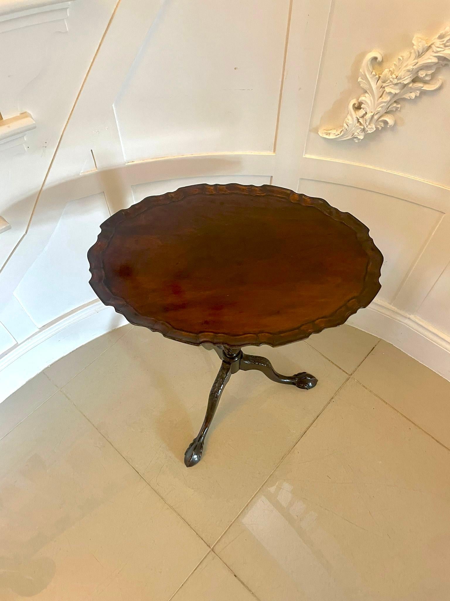 Antique Victorian quality carved mahogany lamp table having a quality mahogany oval shaped tilt top with a moulded edge supported by a turned carved mahogany column standing on shaped carved mahogany cabriole legs with claw feet 


A charming piece