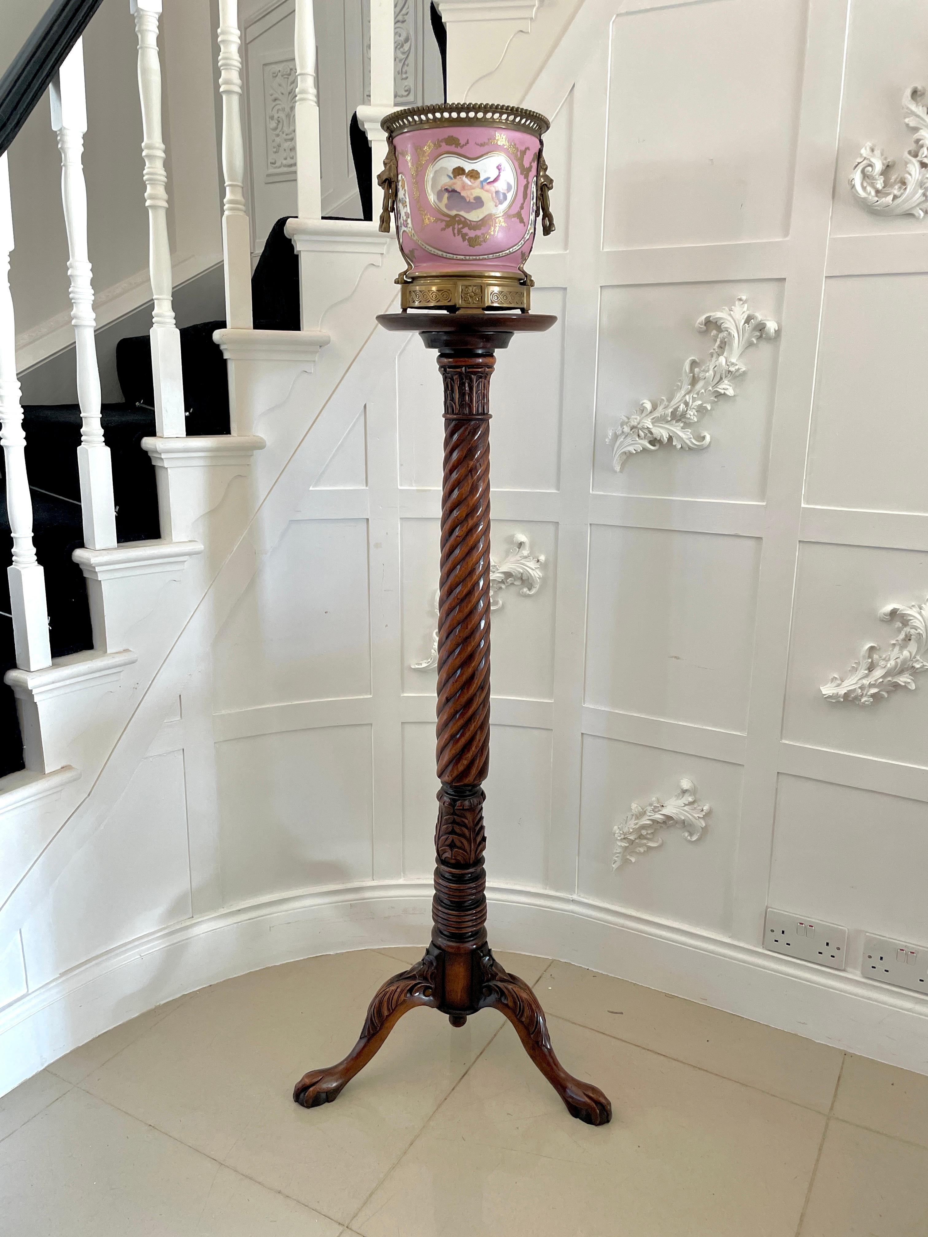 Antique Victorian quality carved mahogany torchere having a circular top with a moulded edge supported by a quality carved rope twist column standing on three shaped carved cabriole legs with claw feet 
Measures: H 135 x W 55.5 x D 29cm
Diameter