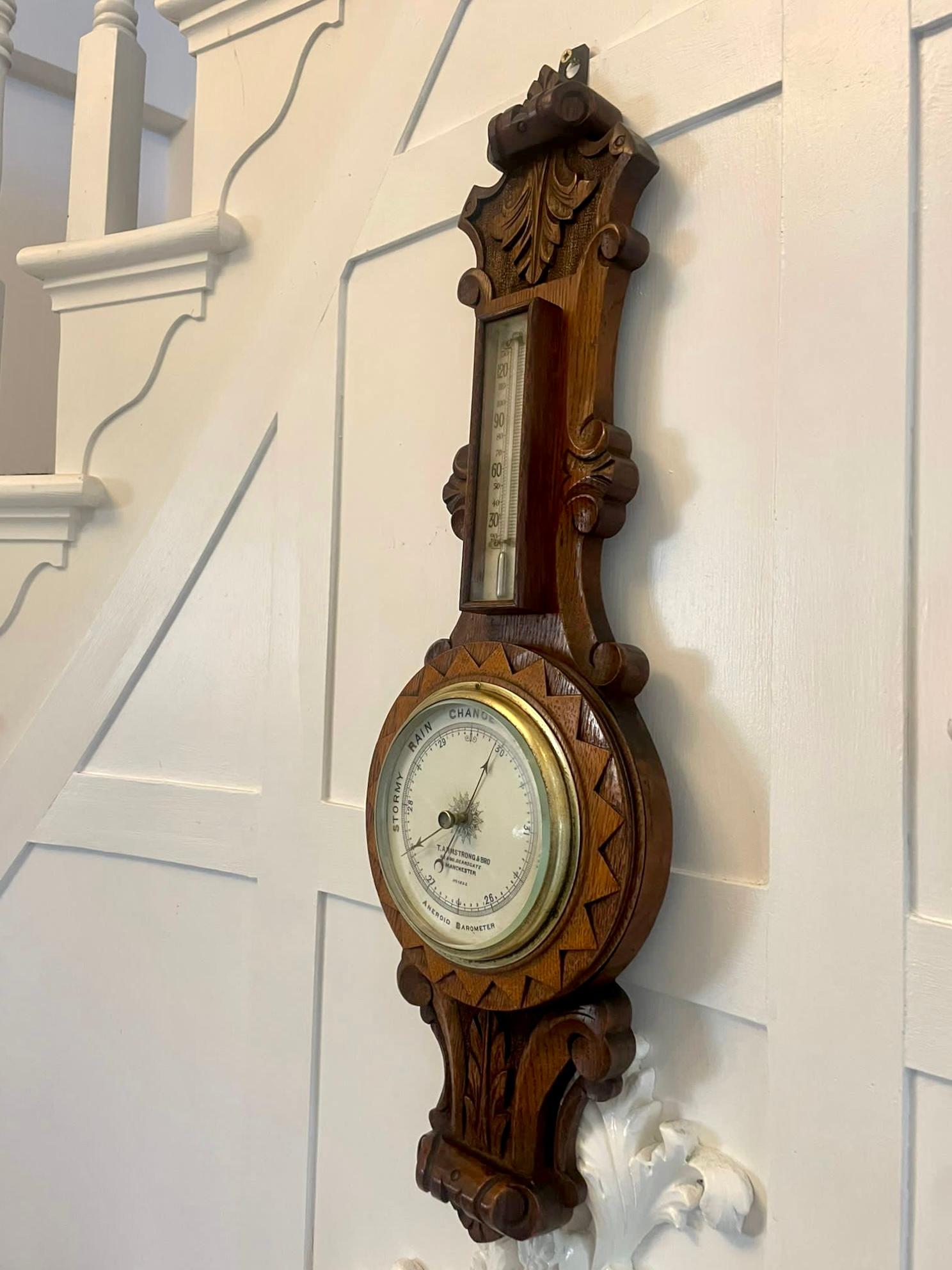 Antique Victorian quality carved oak aneroid banjo barometer having a quality carved oak shaped case with a brass bezel porcelain dial with original hands and a thermometer


In lovely original condition and good working order


Dimensions:
Height