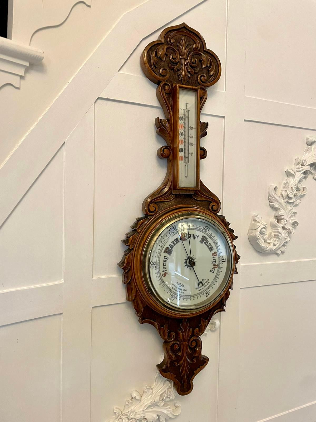 Antique Victorian quality carved oak banjo barometer having a quality carved oak shaped case with a brass bezel, porcelain dial with original hands and a thermometer 

An attractive example in good working order


Dimensions:
H 85.5 x W 30 x D