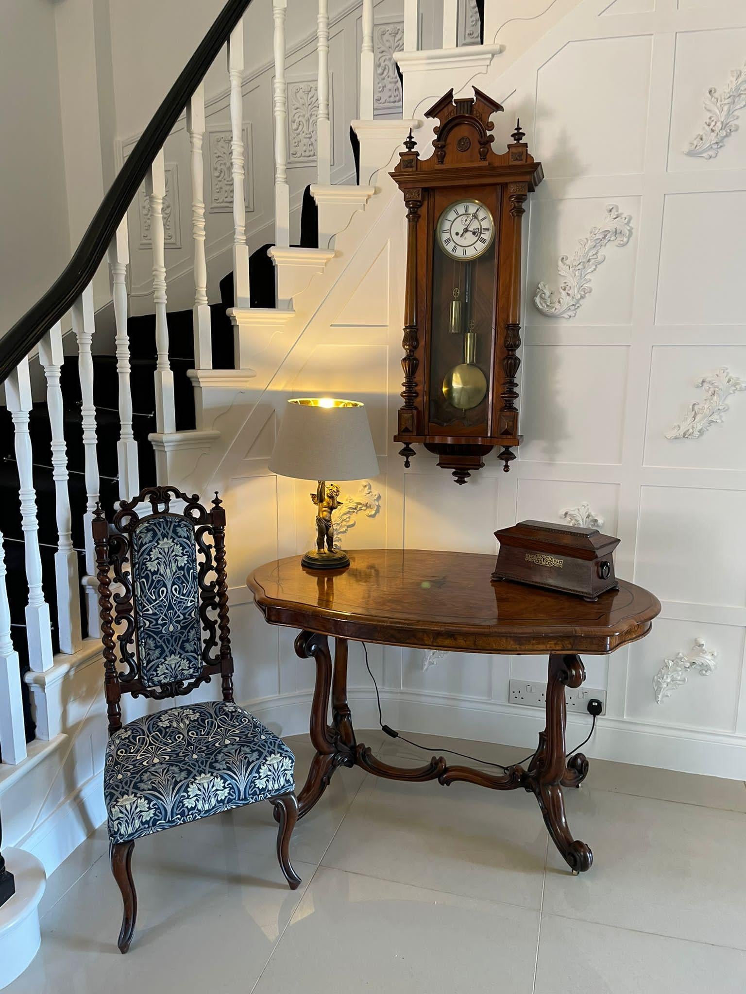 Antique Victorian quality carved walnut Vienna wall clock by Gustav Becker having a quality carved walnut case with reeded turned columns, original finales, shaped top and bottom, single walnut and glazed door opening to reveal a circular porcelain