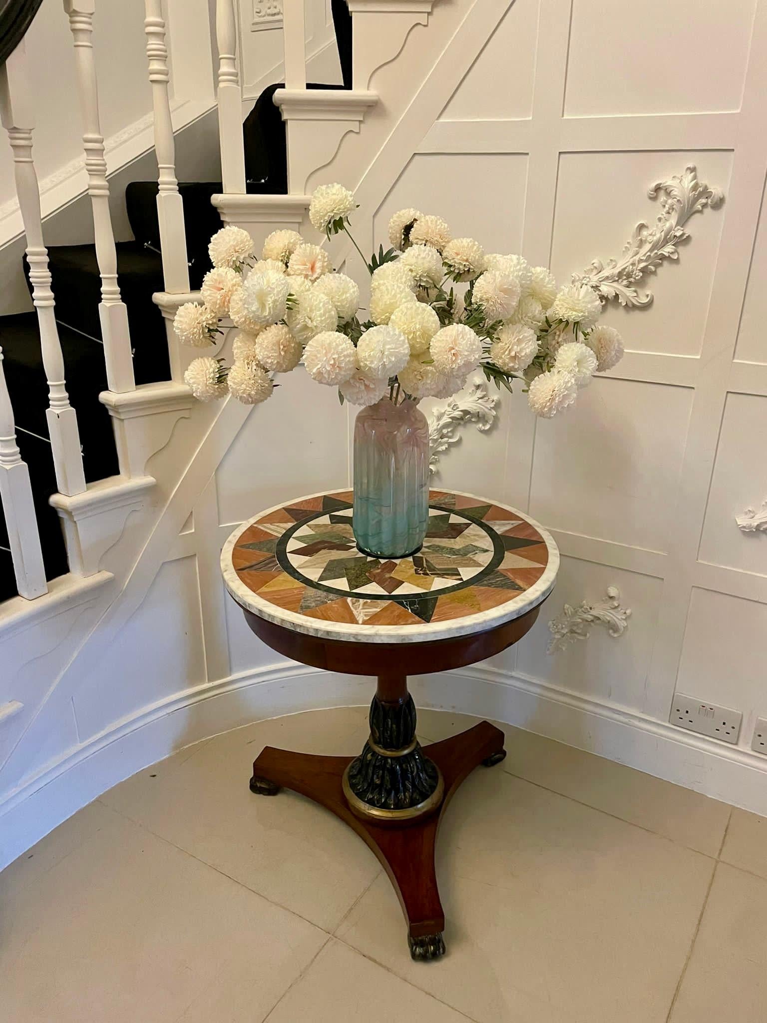 Antique Victorian quality circular specimen marble top lamp/centre table having a marvellous quality circular specimen marble top, mahogany frieze supported by an unusual turned mahogany pedestal column with carved gilded leaf decoration standing on