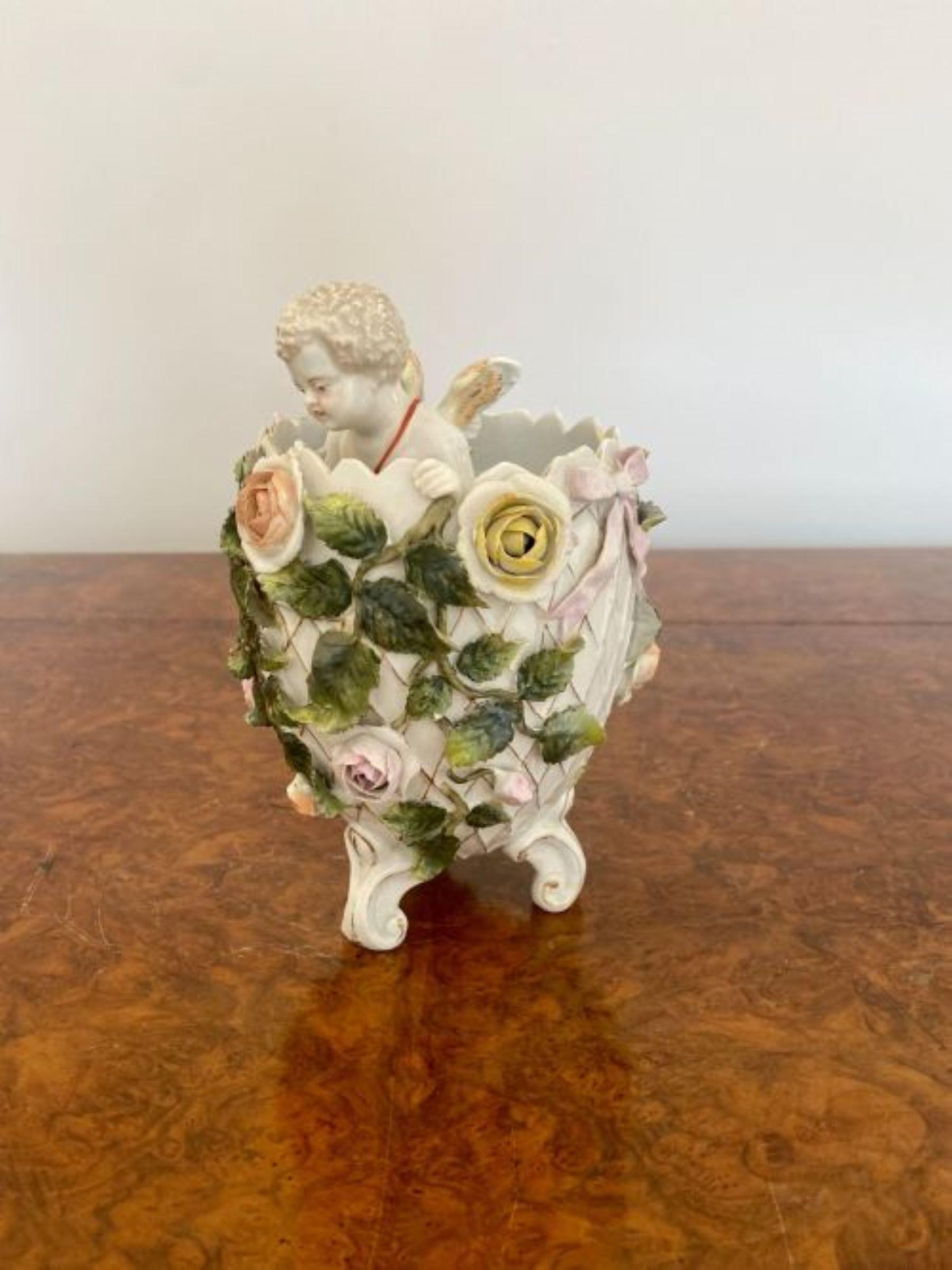 19th Century Antique Victorian quality continental porcelain cherub in a vase For Sale