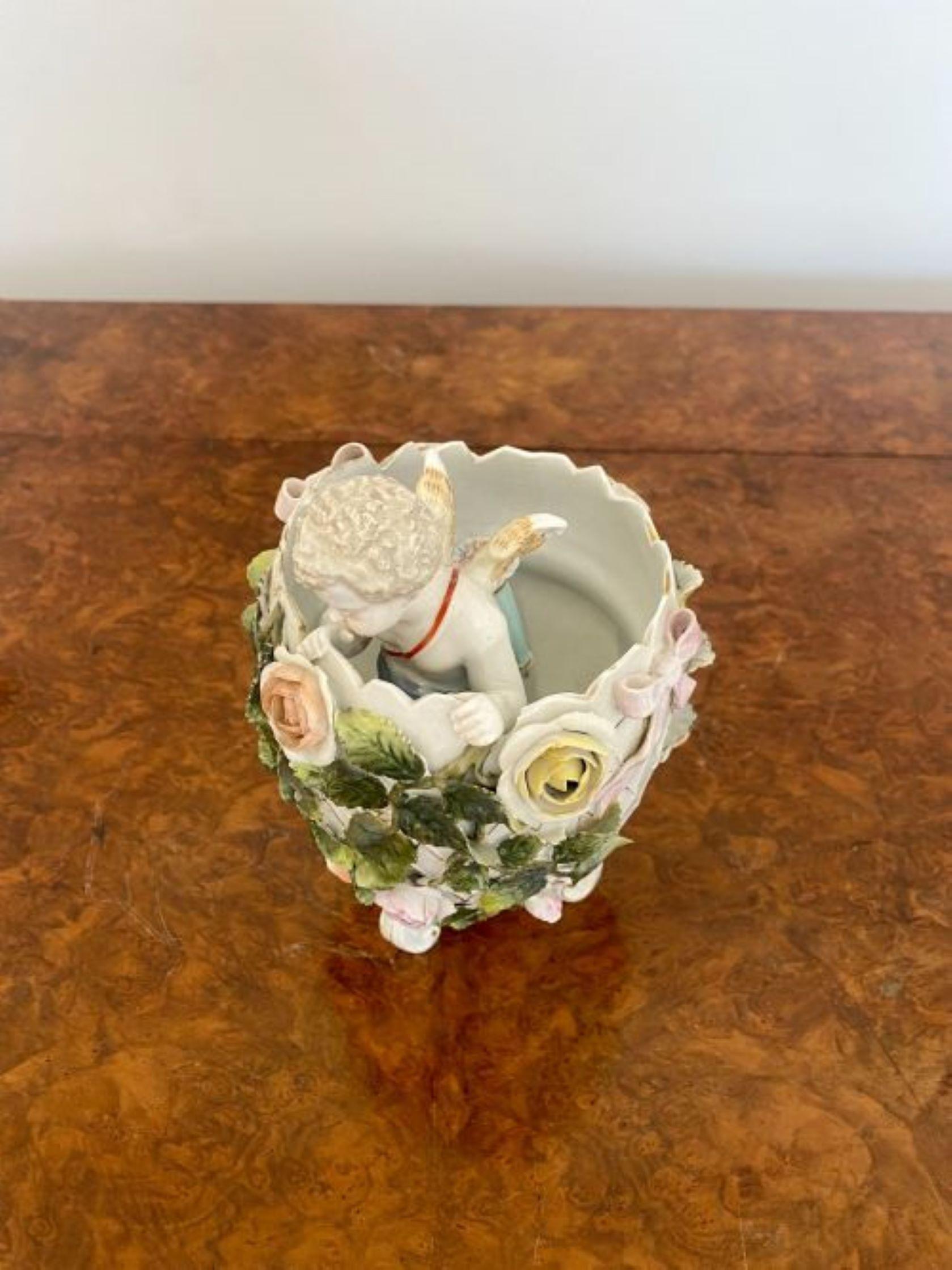 Porcelain Antique Victorian quality continental porcelain cherub in a vase For Sale