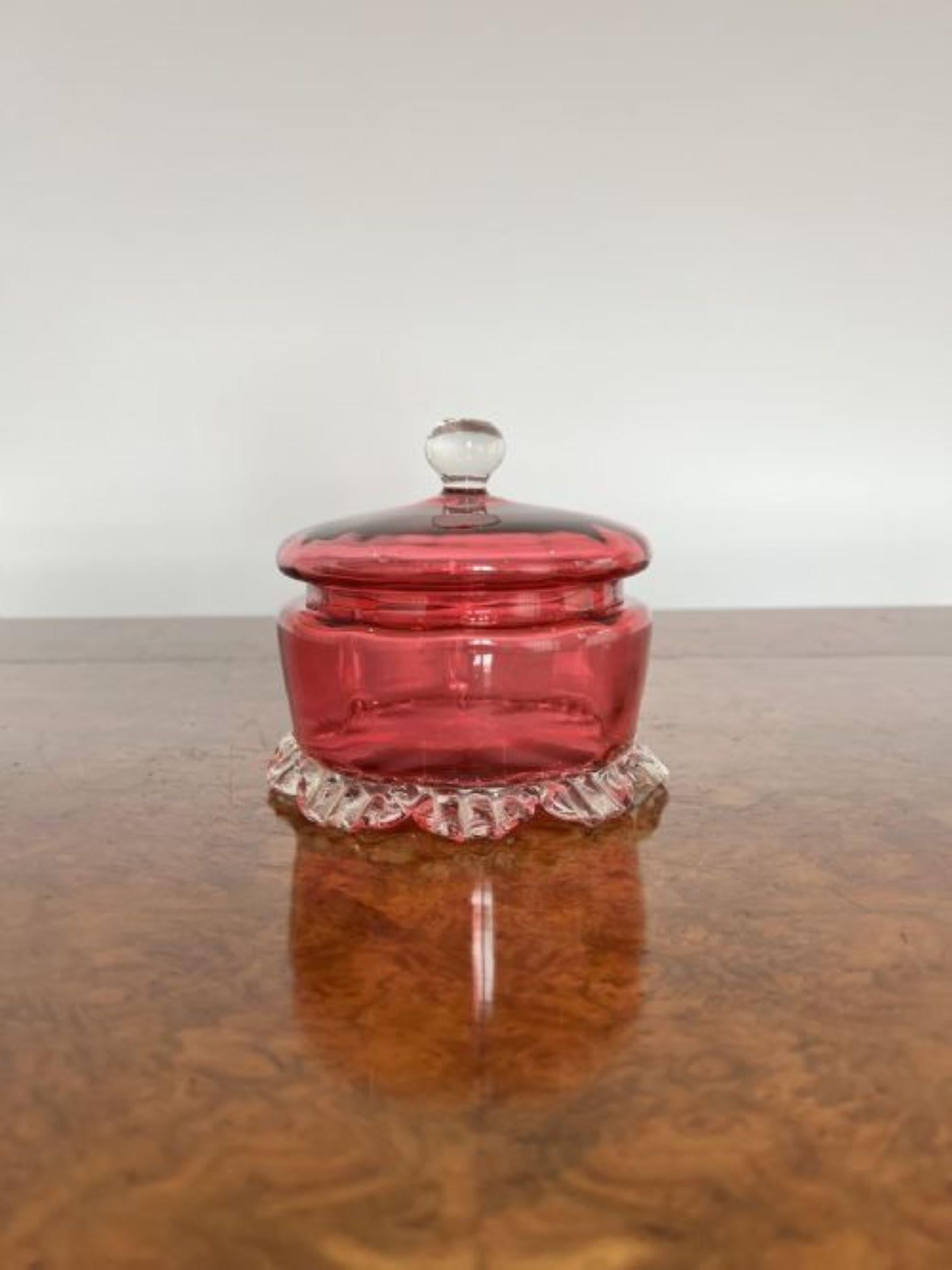 Antique Victorian quality cranberry glass lidded bowl having a quality cranberry glass lift off lid on a cranberry glass bowl with an ornate base 
