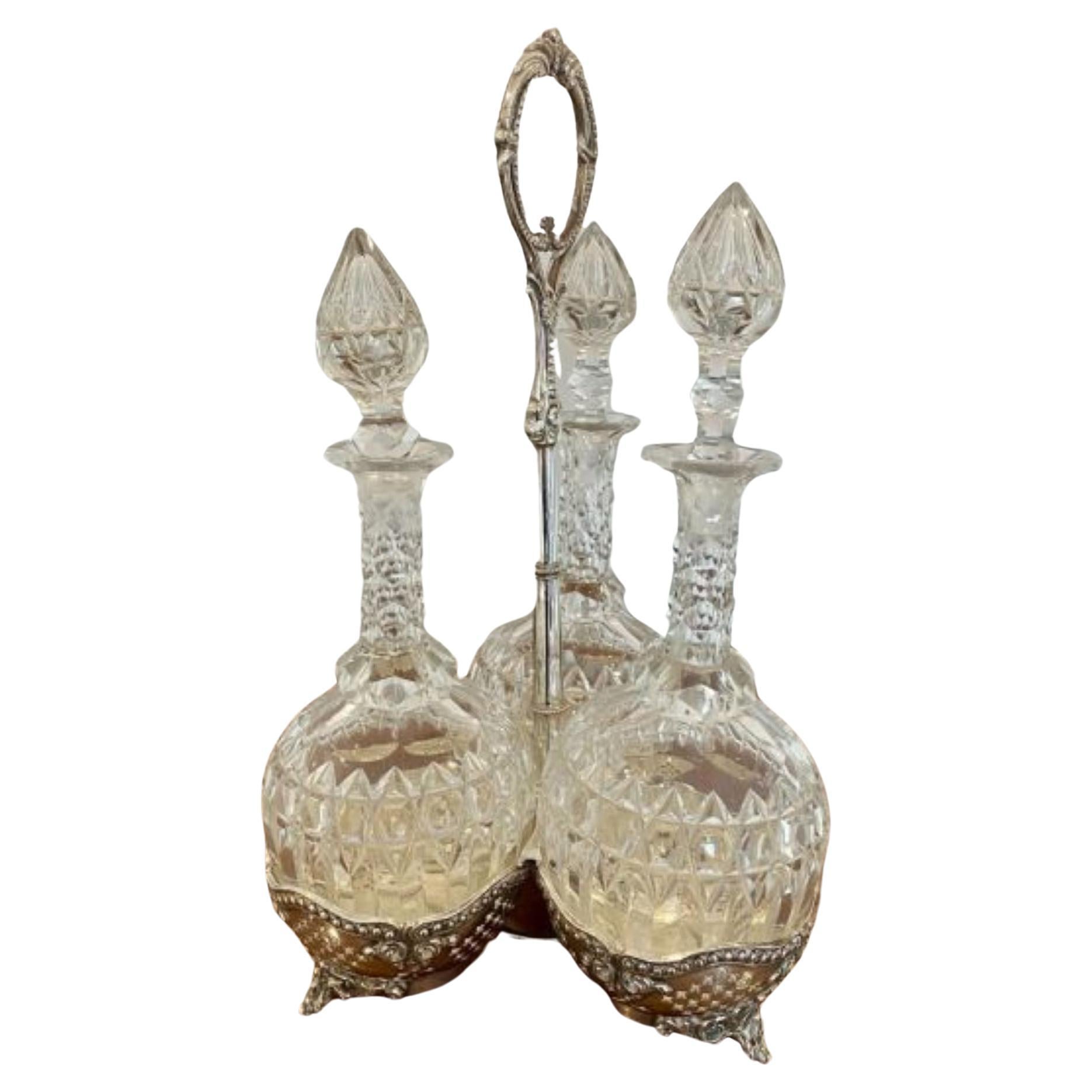 Antique Victorian quality cut glass decanters & original silver plated stand