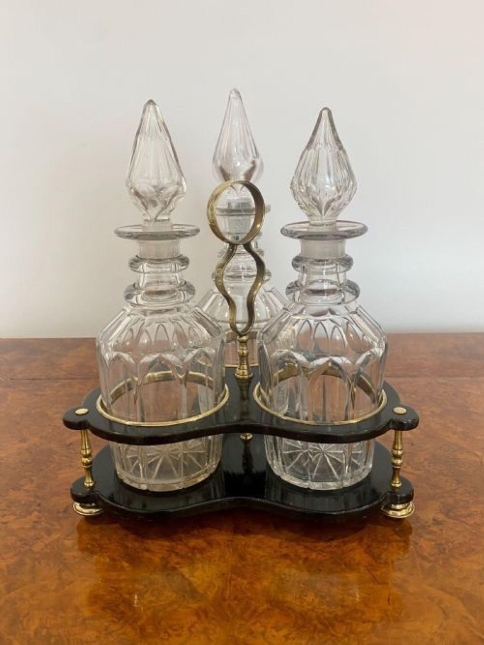 Glass Antique Victorian quality decanter stand with three original cut glass decanters For Sale