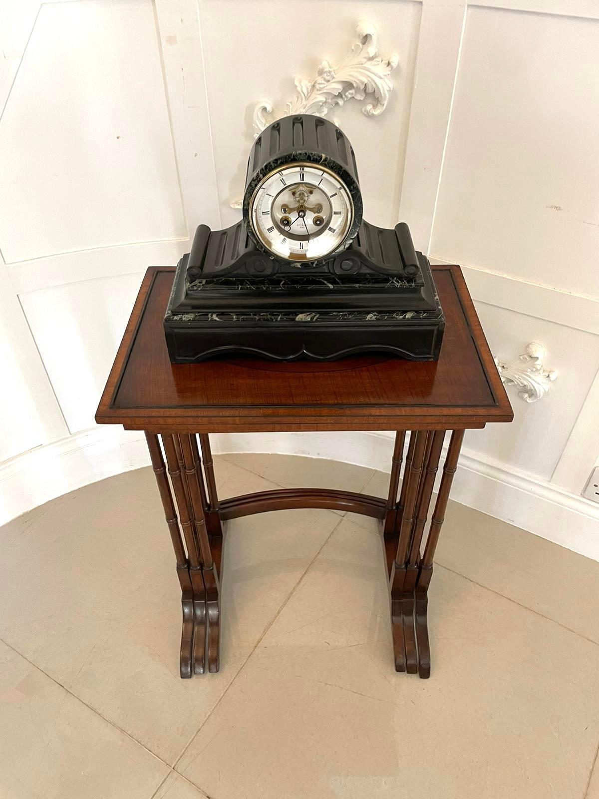 Antique Victorian quality drum head marble mantle clock having a quality marble clock with an 8 day French movement striking on the hour and half hour on a bell, an enamel dial with Roman numerals, original hands and a visible escapement, brass