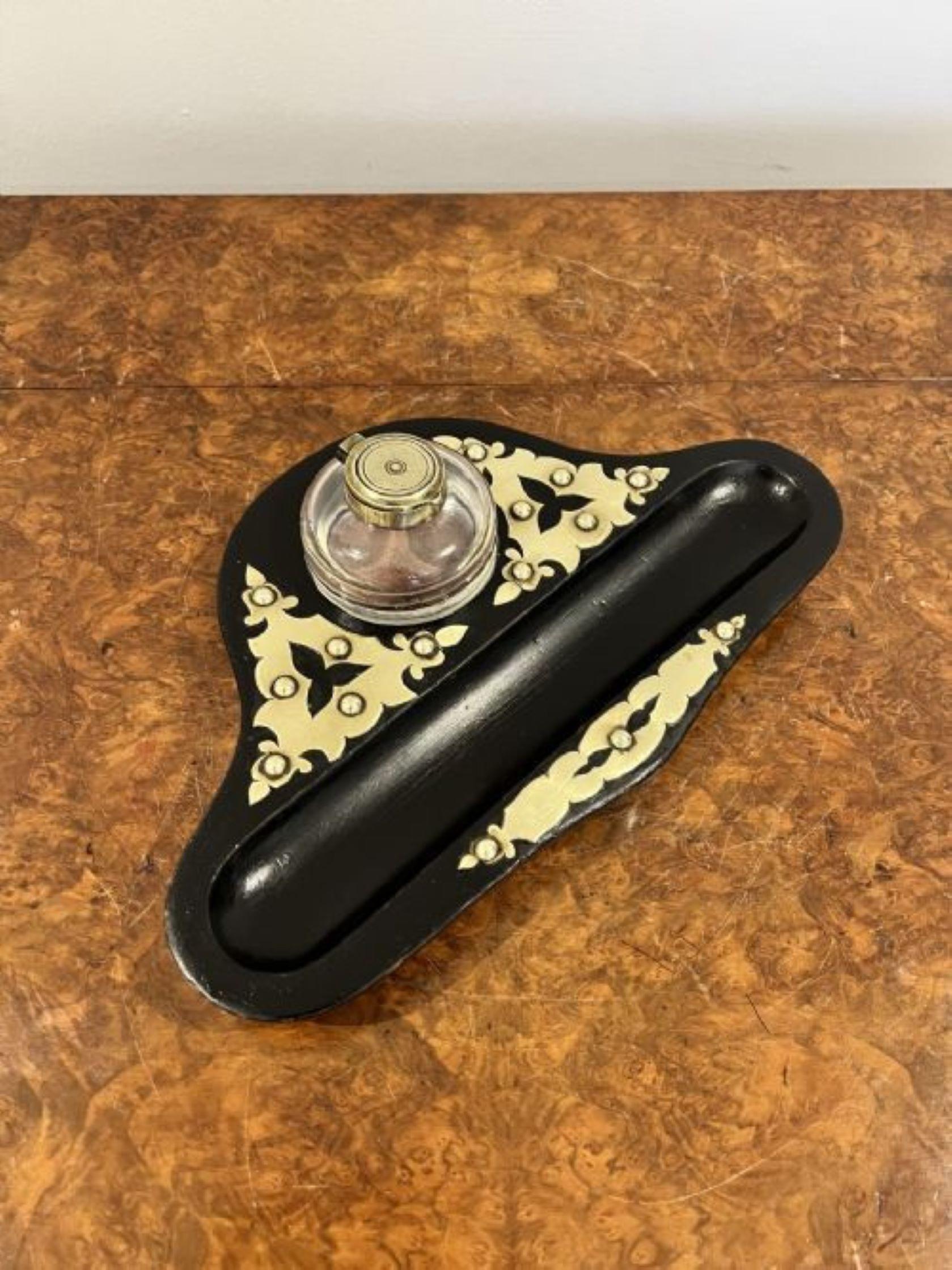 Antique Victorian quality ebonised and brass desk set having a quality ebonised and ornate brass desk set with a pen tray and the original glass ink well with a brass top  