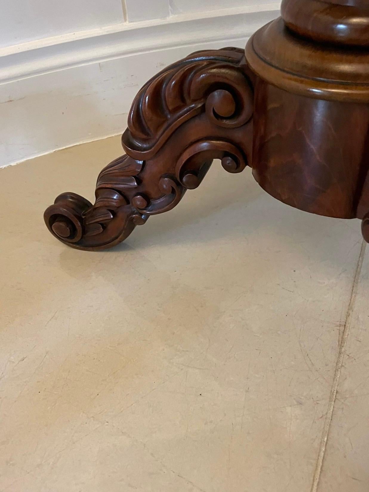 Antique Victorian quality figured mahogany card/console table having a quality figured mahogany serpentine shaped fold over top opening to reveal a green baize interior supported by a pull out drawer, serpentine shaped frieze supported by a shaped