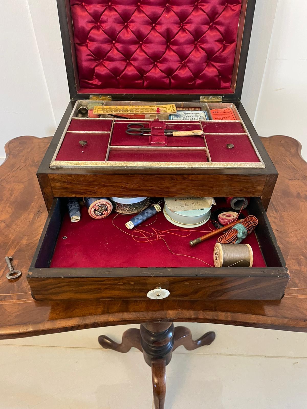 Antique Victorian quality figured walnut sewing box having a brass handle to the lift up top opening to reveal a fitted interior, drop down front opening to reveal a storage drawer 

A charming example with a fabulous colour

Dimensions:
Height 16