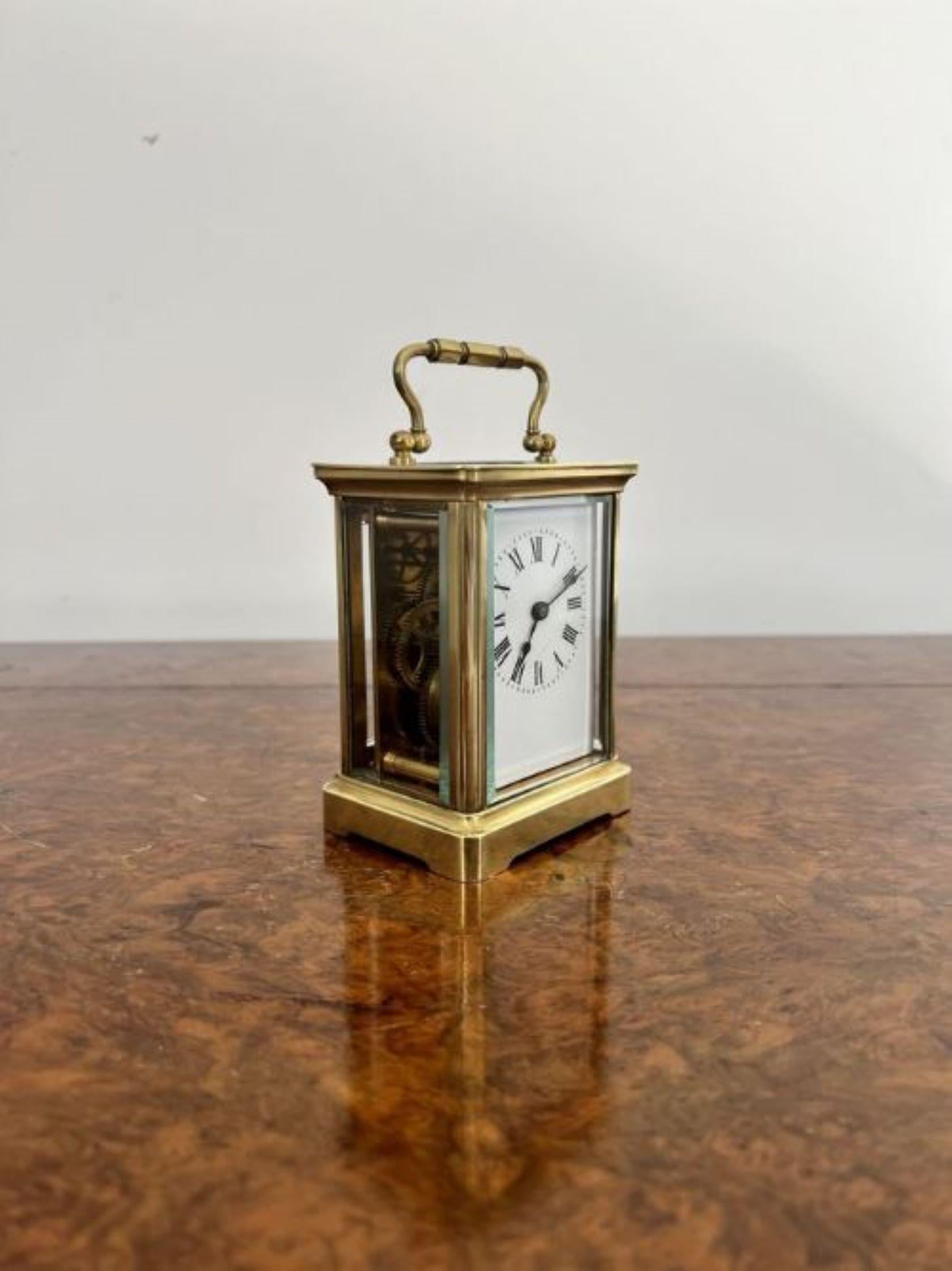 Antique Victorian quality French brass carriage clock having a quality brass case with bevelled glass, white enamel dial with original hands and key, eight day French movement and a handle to the top of the case. 
Please note all of our clocks are