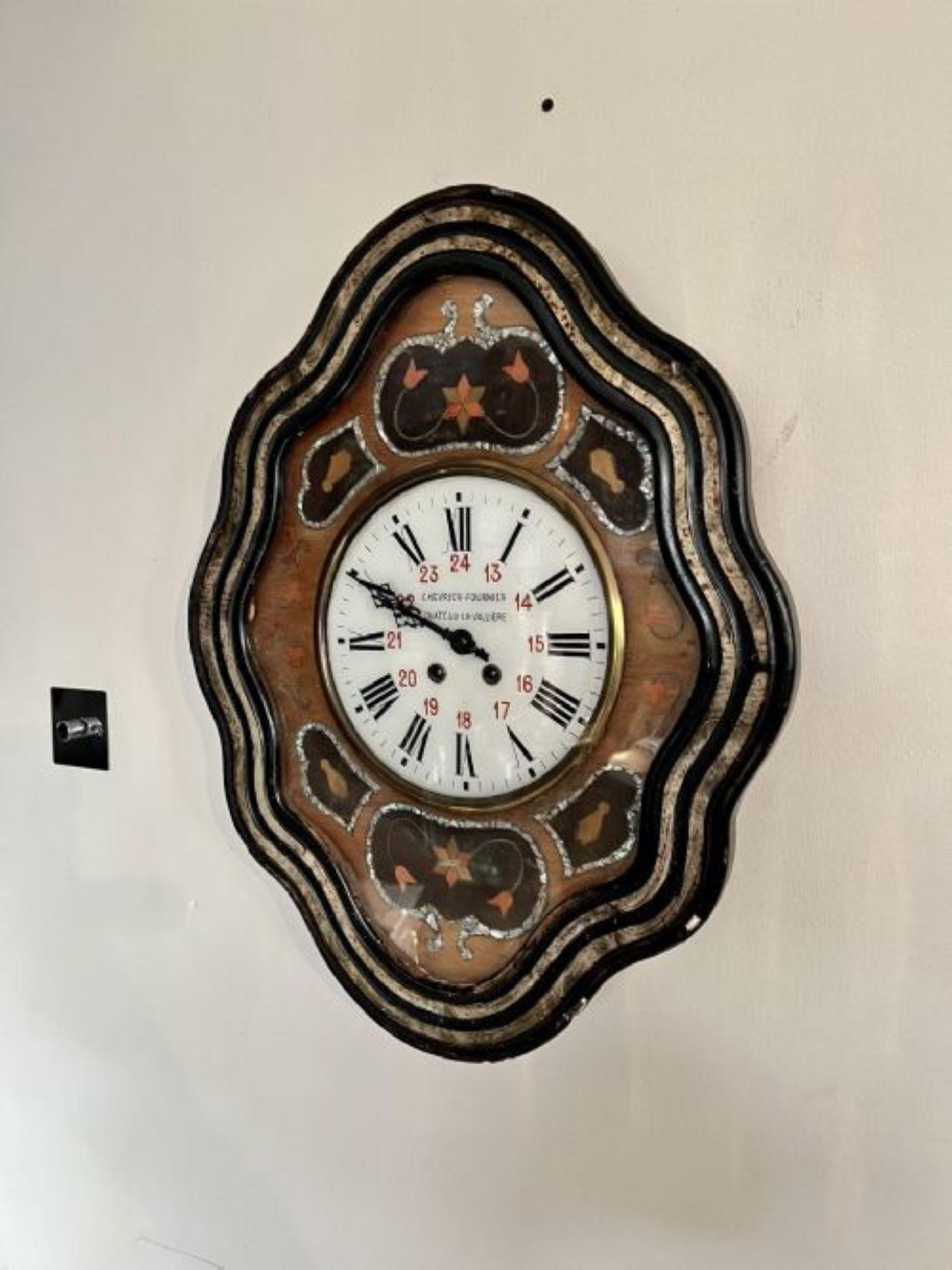 Antique Victorian quality French wall clock in an attractive walnut and agonised shaped case having a fantastic inlaid decorated ornate circular porcelain dial with the original hands, eight day movement striking the hour and half hour on a gong.