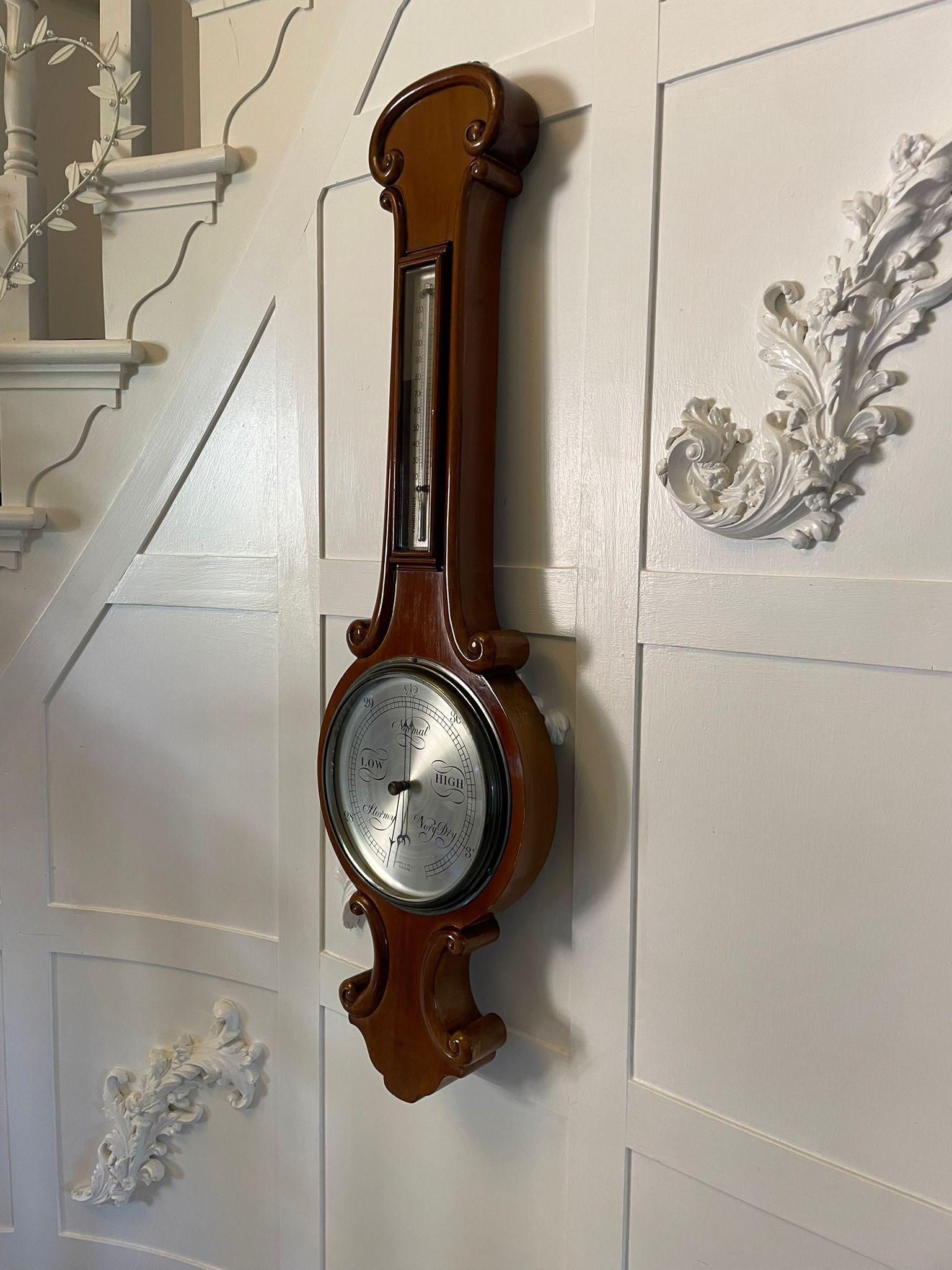 Antique Victorian quality mahogany banjo barometer by James H Kelly of Glasgow 
Having a quality mahogany shaped banjo barometer with scroll shaped carving circular silvered engraved dial with original hands and a thermometer 

A charming example