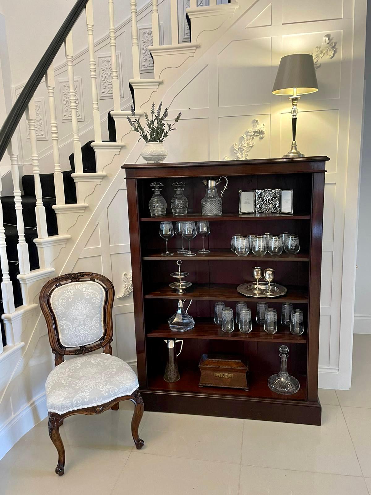 Antique Victorian quality mahogany open bookcase having a quality mahogany top with a moulded edge, four adjustable shelves and raised on a plinth base.

A fabulous example of the Victorian period in wonderful original condition and of desirable