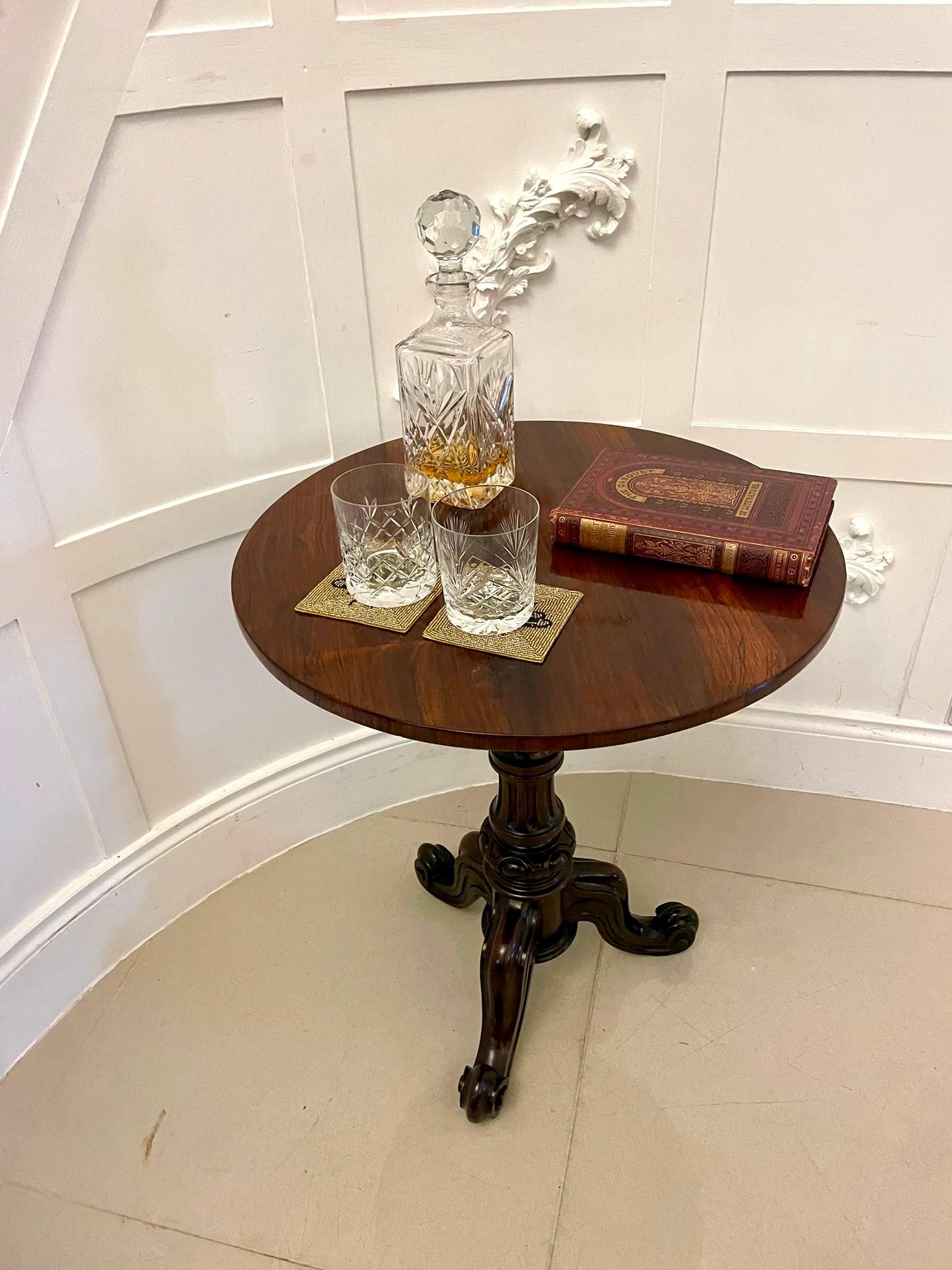 Antique Victorian quality rosewood circular lamp table having a quality rosewood circular tilt top supported by a turned carved reeded pedestal column standing on shaped carved cabriole legs with scroll feet


Dimensions:
Height 66 cm 
Width 56 cm