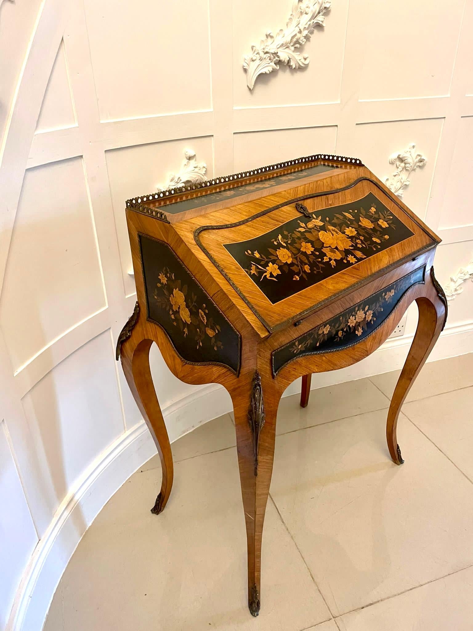Antique Victorian quality satinwood freestanding marquetry inlaid French bureau having the original brass gallery, beautiful floral marquetry inlaid top above a satinwood floral marquetry inlaid fall with ornate gilded brass beading opening to