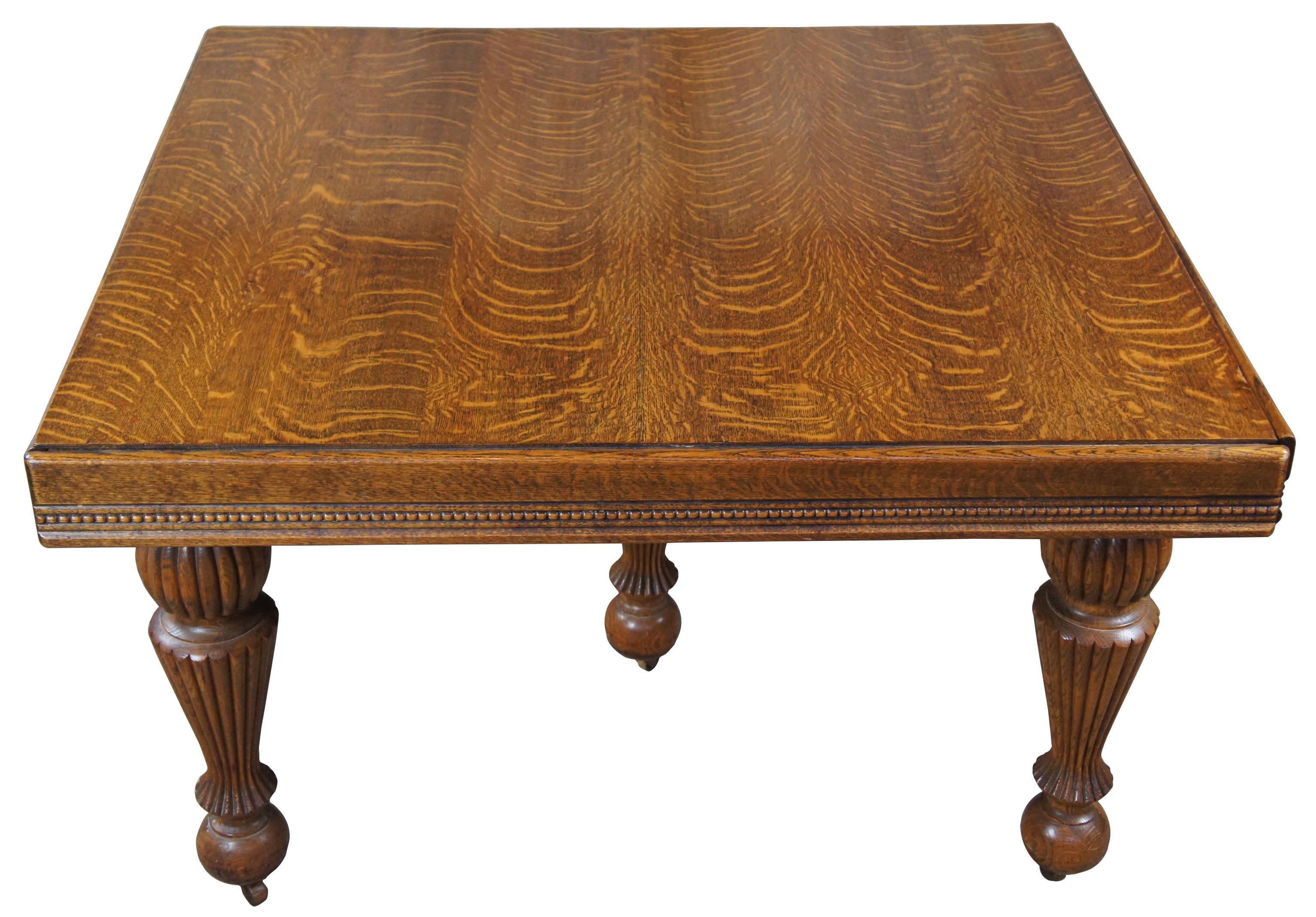 Turn of the 20th century quartersawn tiger oak dining table. Measures: 93