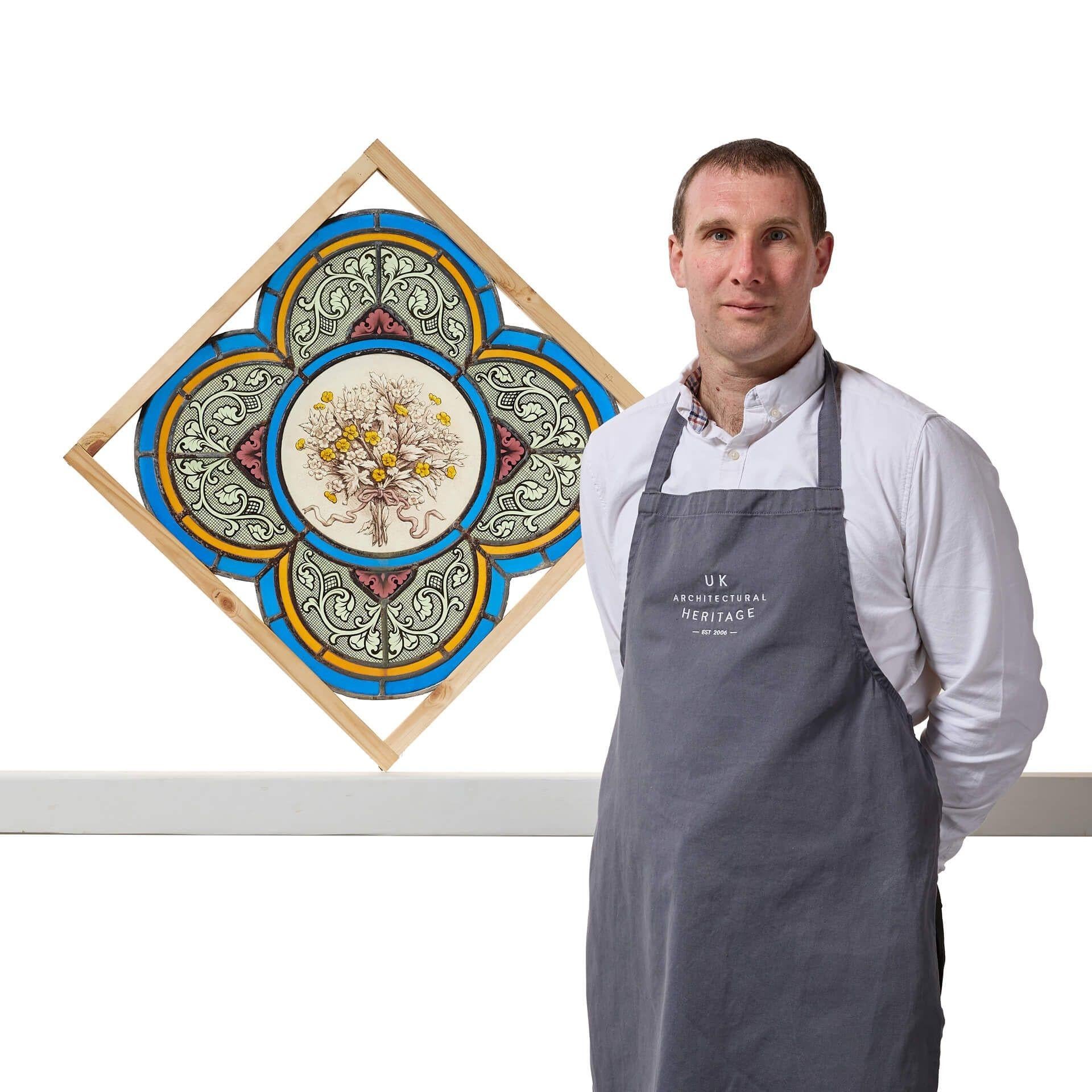 An antique Victorian stained glass quatrefoil panel depicting a floral spray and scrolled decoration.

Dating to circa 1900, this vivid colours of this English panel would look striking flooded with daylight as a stunning and detailed interior