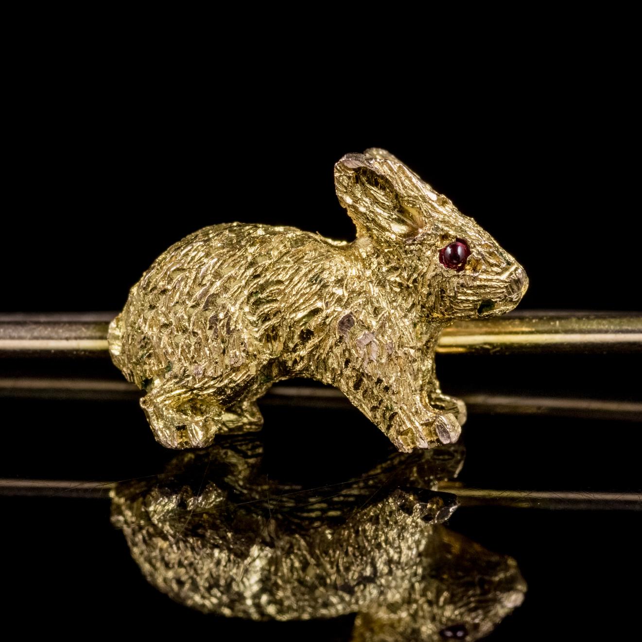 This delightful little antique 18ct Gold Rabbit brooch is Victorian, Circa 1900. 

The piece features a lovely engraved Rabbit with a red Garnet eye resting on top of a strong 18ct Gold pin. 

Victorian jewellery mirrored Queen Victoria’s life with