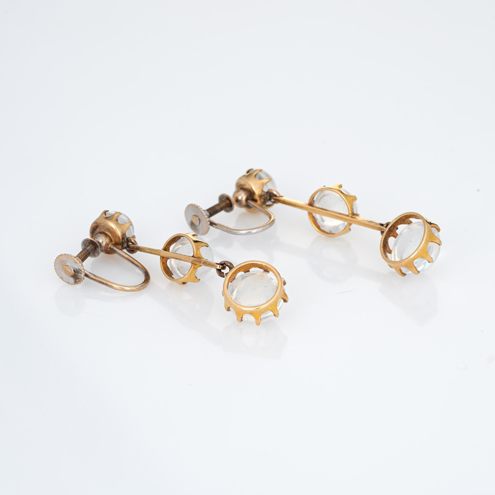 Finely detailed pair of antique Victorian moonstone drop earrings (circa 1880s to 1900s) crafted in 14k yellow gold. 

Six moonstones graduate in size from 7mm to 9mm. The moonstones are in very good condition and free of cracks or chips.  

The