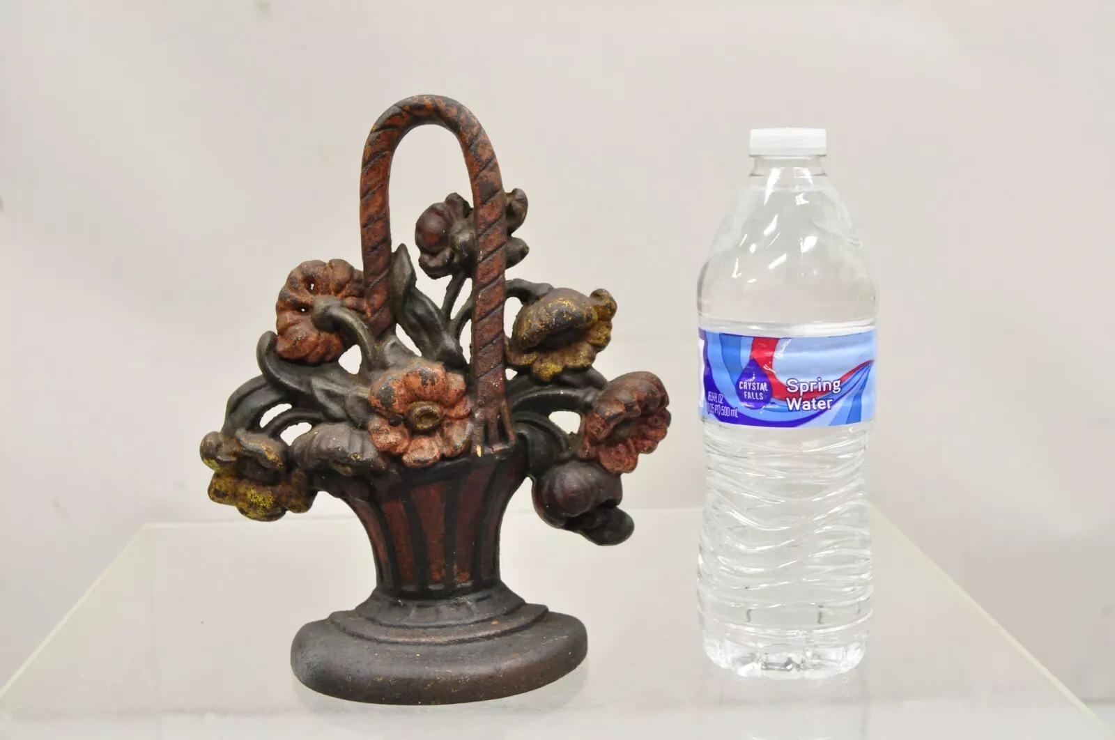 Antique Victorian Red Cast Iron Figural Painted Floral Bouquet Basket Door Stop. Circa Early 1900s. Measurements: 8.5