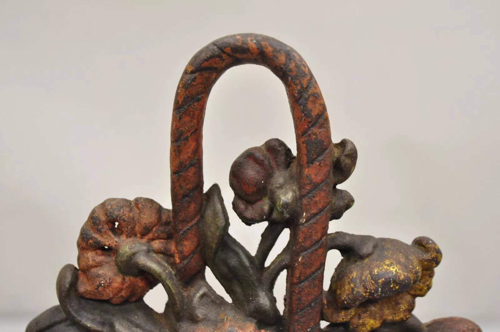 Antique Victorian Red Cast Iron Figural Painted Floral Bouquet Basket Door Stop In Good Condition For Sale In Philadelphia, PA