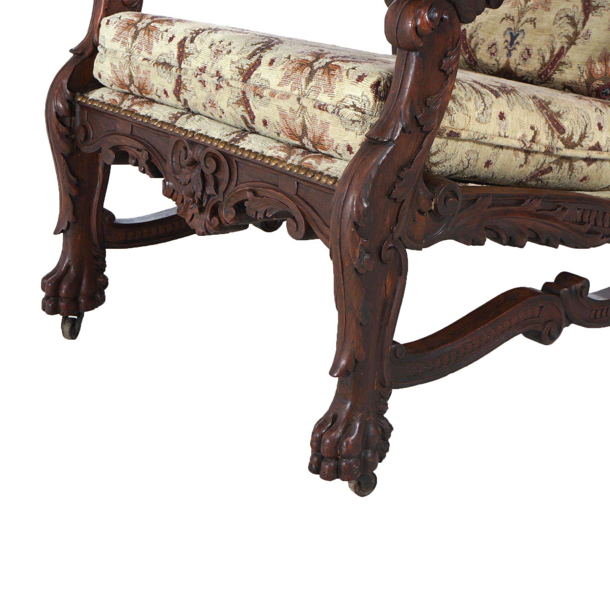 ***Reduced Delivery Rates - See Below or Click “Ask The Seller” to Request a Quote***

Antique Victorian Renaissance Revival Figural Carved Walnut Morris Chair with Carved Heads, Foliate Elements and Paw Feet, Upholstered Back & Seat,