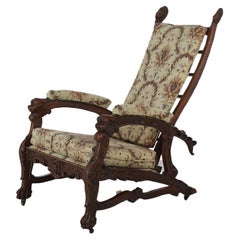 Antica sedia Morris in noce intagliata di epoca vittoriana rinascimentale C1890