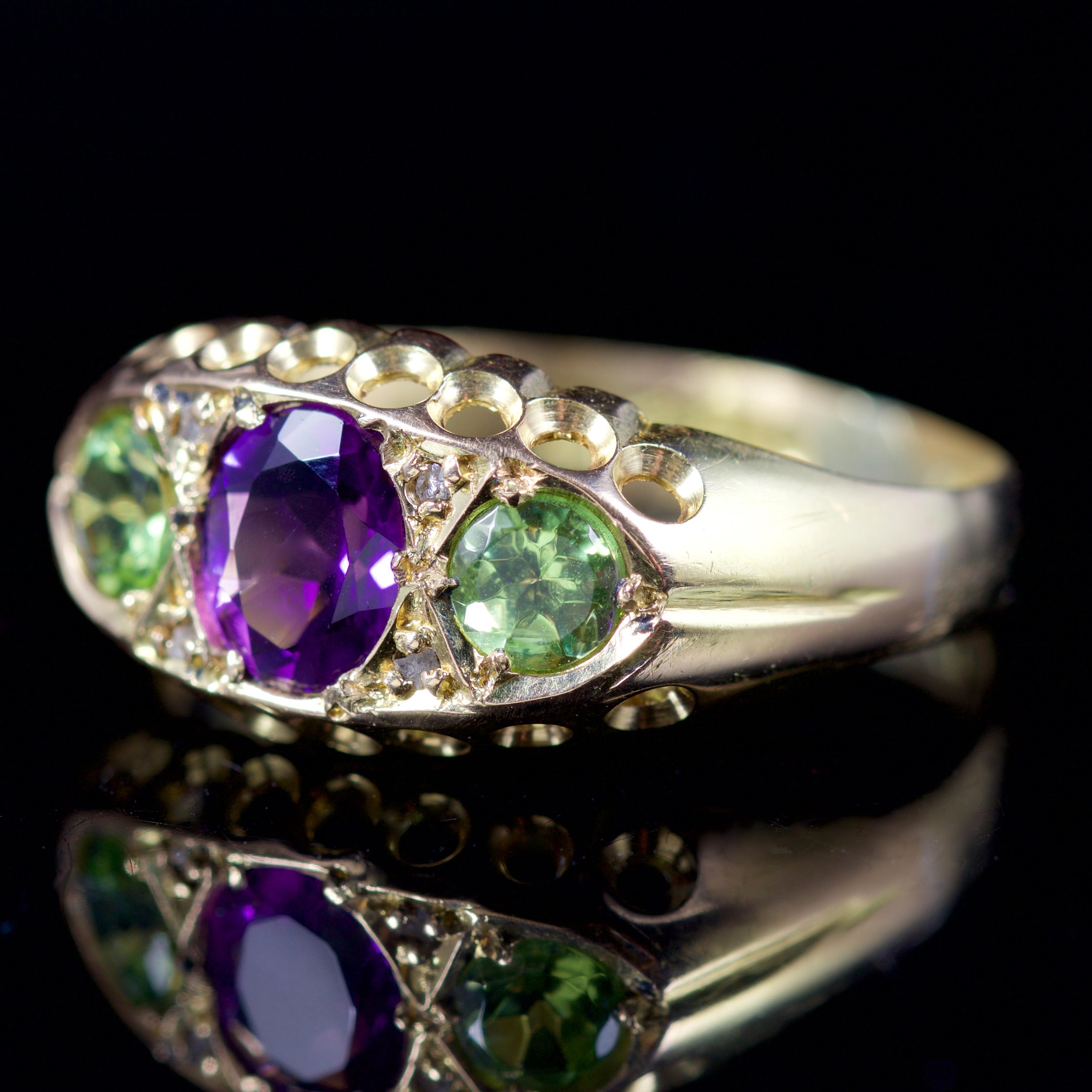 This fabulous Victorian Suffragette ring is set in 18ct Gold, dated 1912

It boasts an 0.70ct Amethyst in the centre, with two green 0.20ct Peridots and four glistening Diamond set in-between.

The ring is decorated in a beautiful combination of