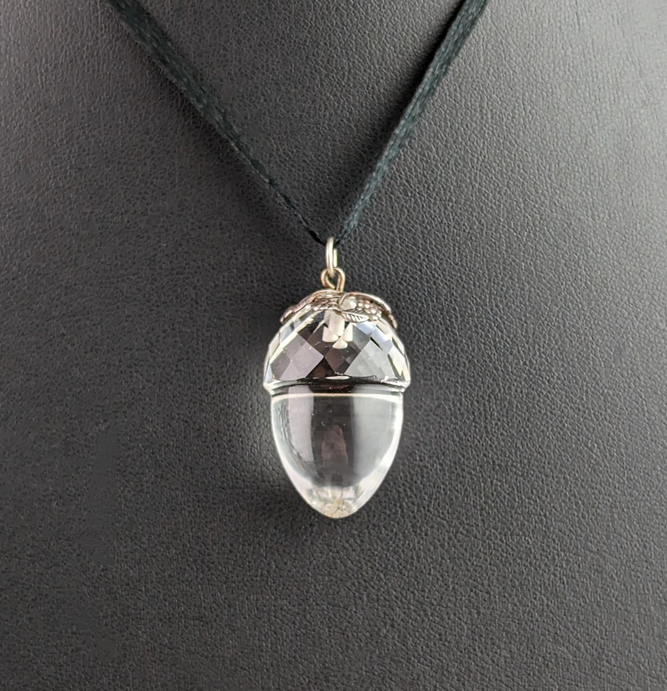 You can't help but be enamoured by this wonderful antique Rock crystal acorn pendant.

One of the most charming pieces I have ever seen with the amazing and magical carved rock crystal, the base of the acorn a smooth polished finish much like a