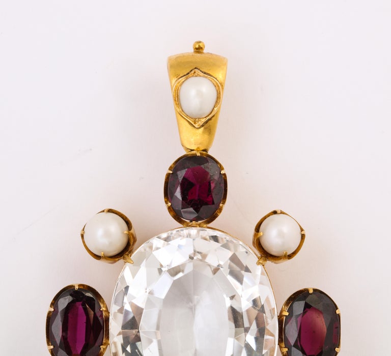 Oval Cut Antique Victorian Rock Crystal Garnet Pendant For Sale