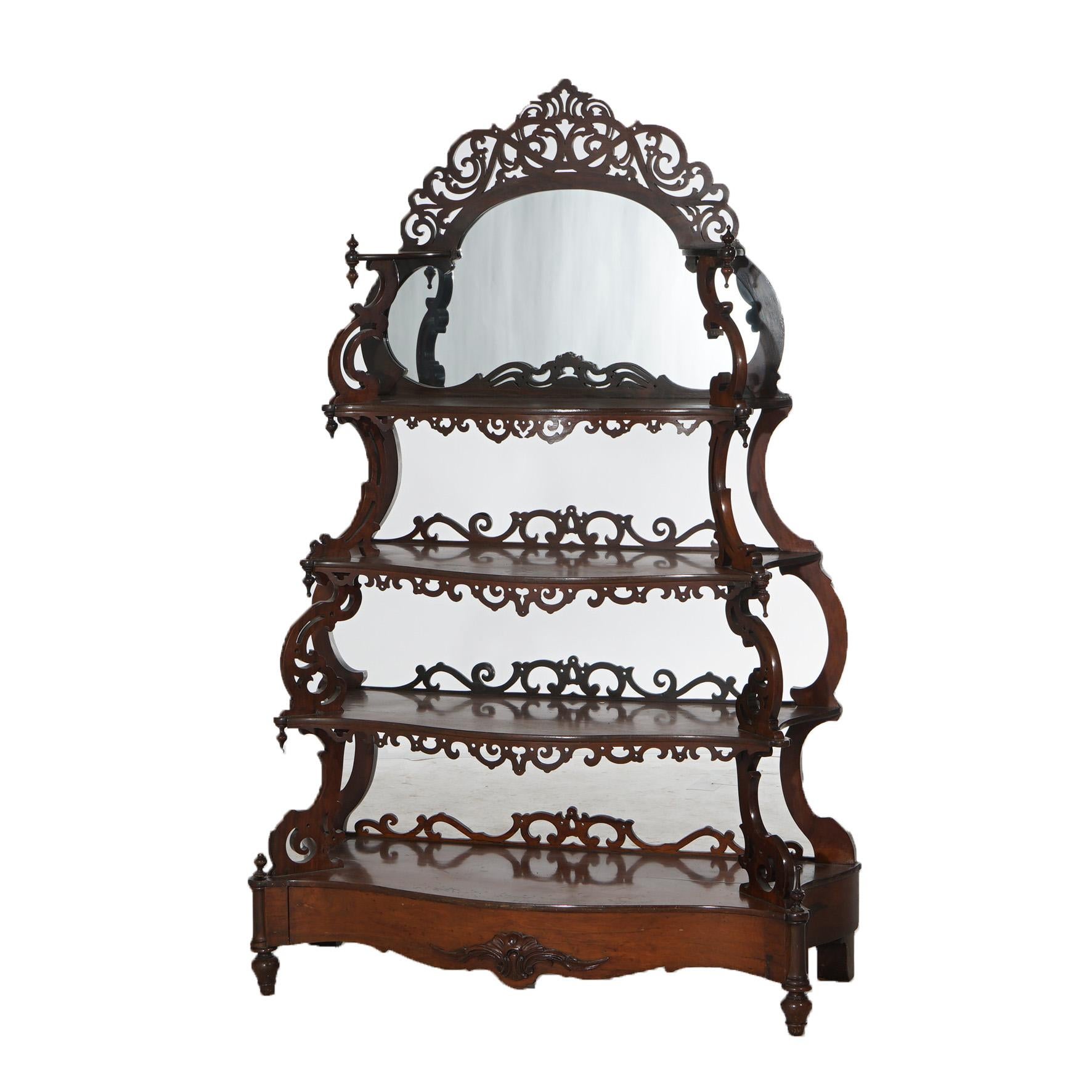 ***Ask About Reduced In-House Shipping Rates - Reliable Service & Fully Insured***
Antique Victorian Rococo Carved Walnut Rosewood Mirrored Etagere with Graduated Shelving and Carved Scroll Elements c1880

Measures - 66