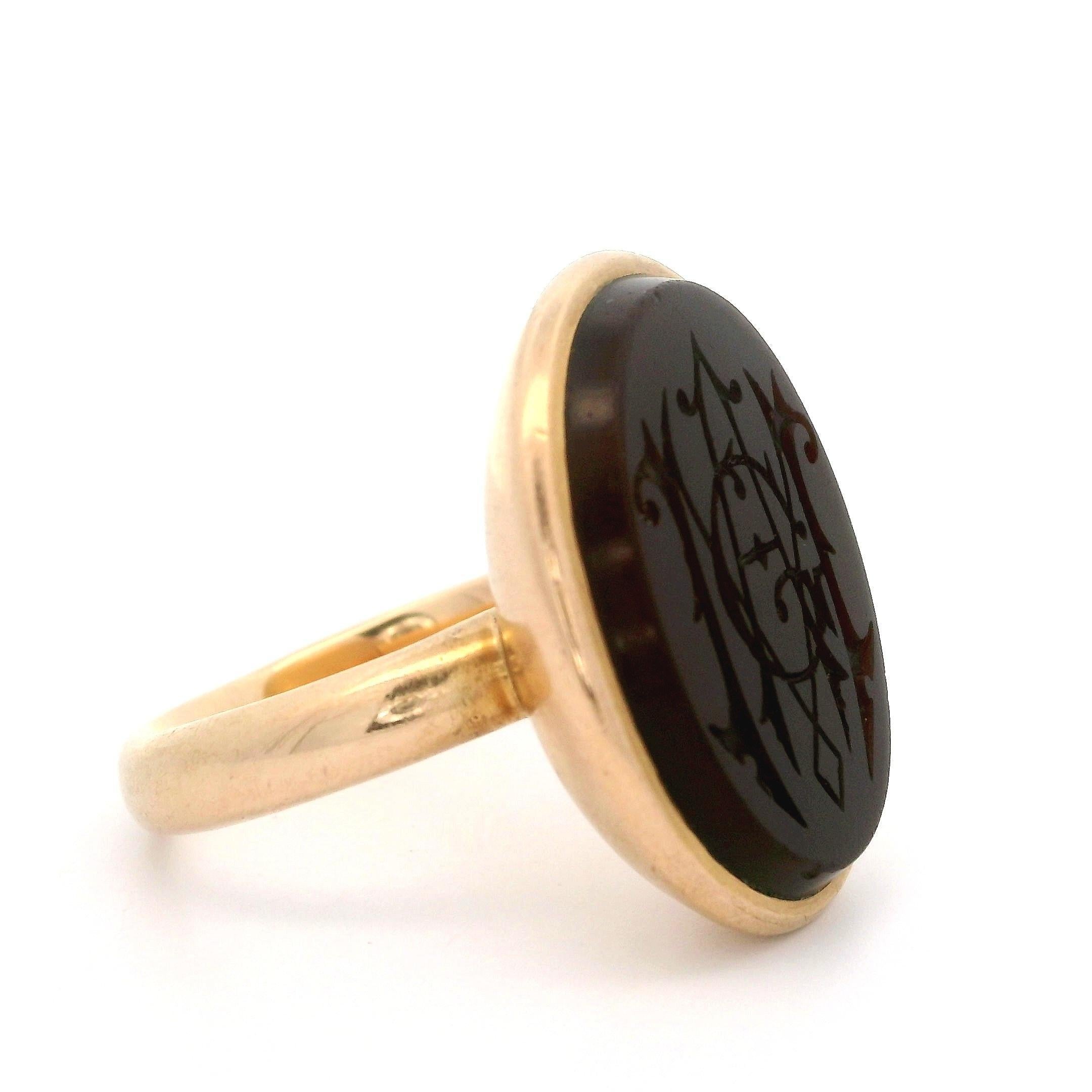 --Stone(s):--
(1) Natural Genuine Carnelian - Oval Shape - Bezel Set - Rich Brown Color - 22.9x18.6mm (approx.)

Material: Solid 14K Rose Gold
Weight: 11.22 Grams
Ring Size: 10.5 (We can custom size this ring - please contact us prior to purchase