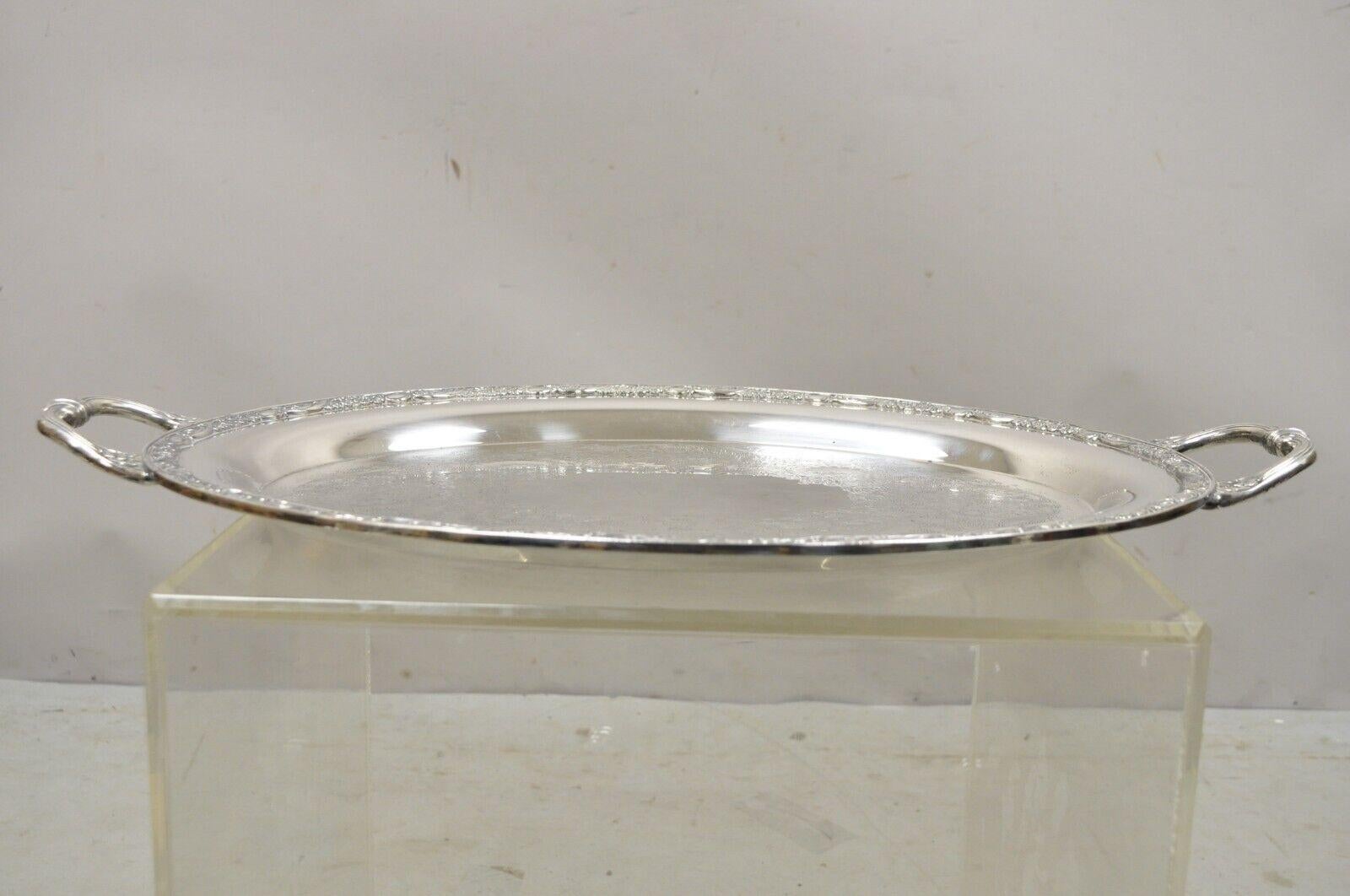 Antique Victorian Rose WM Rogers & Son oval silver plated platter tray. circa early to Mid-20th Century. Measurements: 1.75