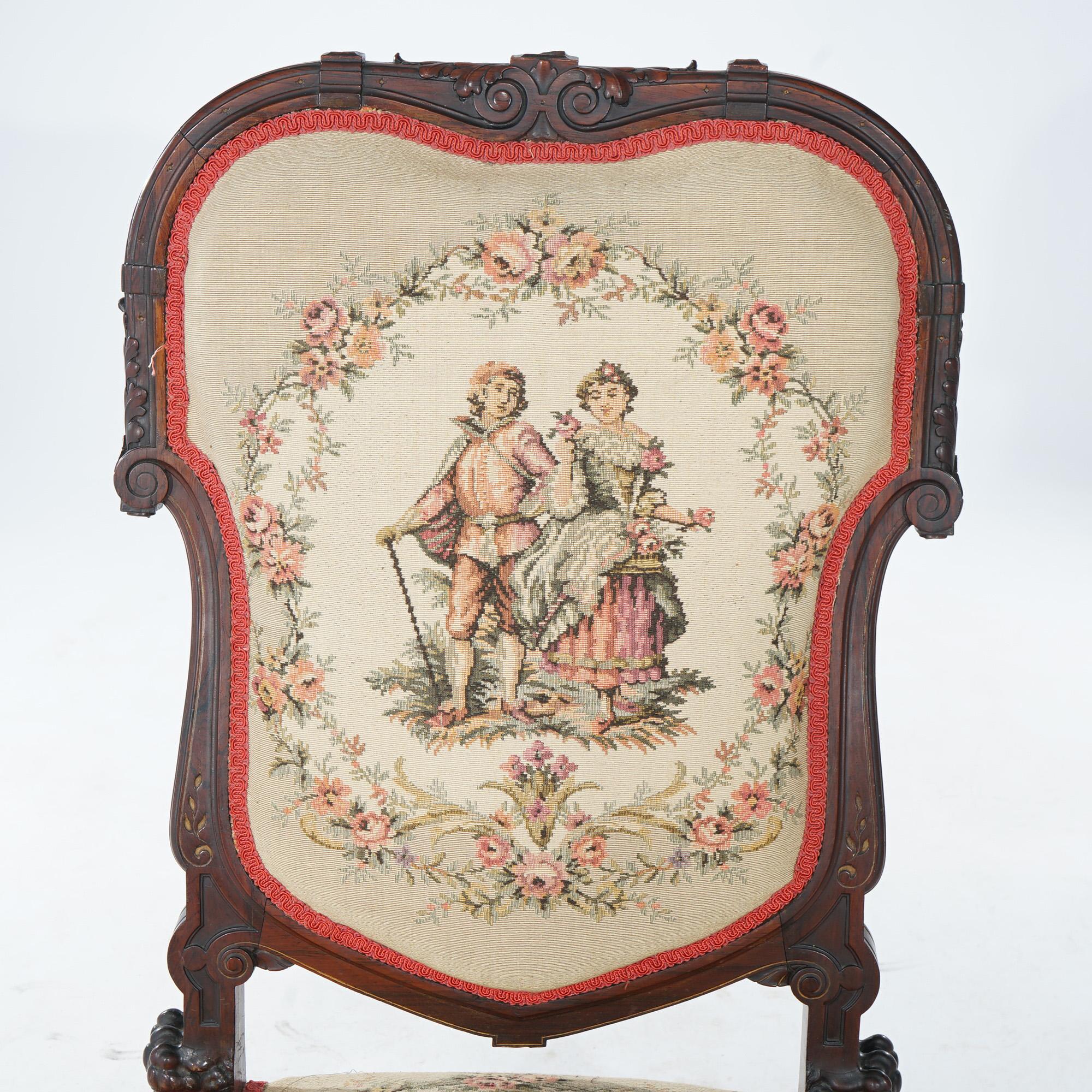 An antique Victorian slipper chair offers rosewood construction with gilt incised decoration and upholstered in tapestry with courting scene, 19th century
Rosewood & Gilt Incised Tapestry Slipper Chair, 19th century

Measures - 27.75